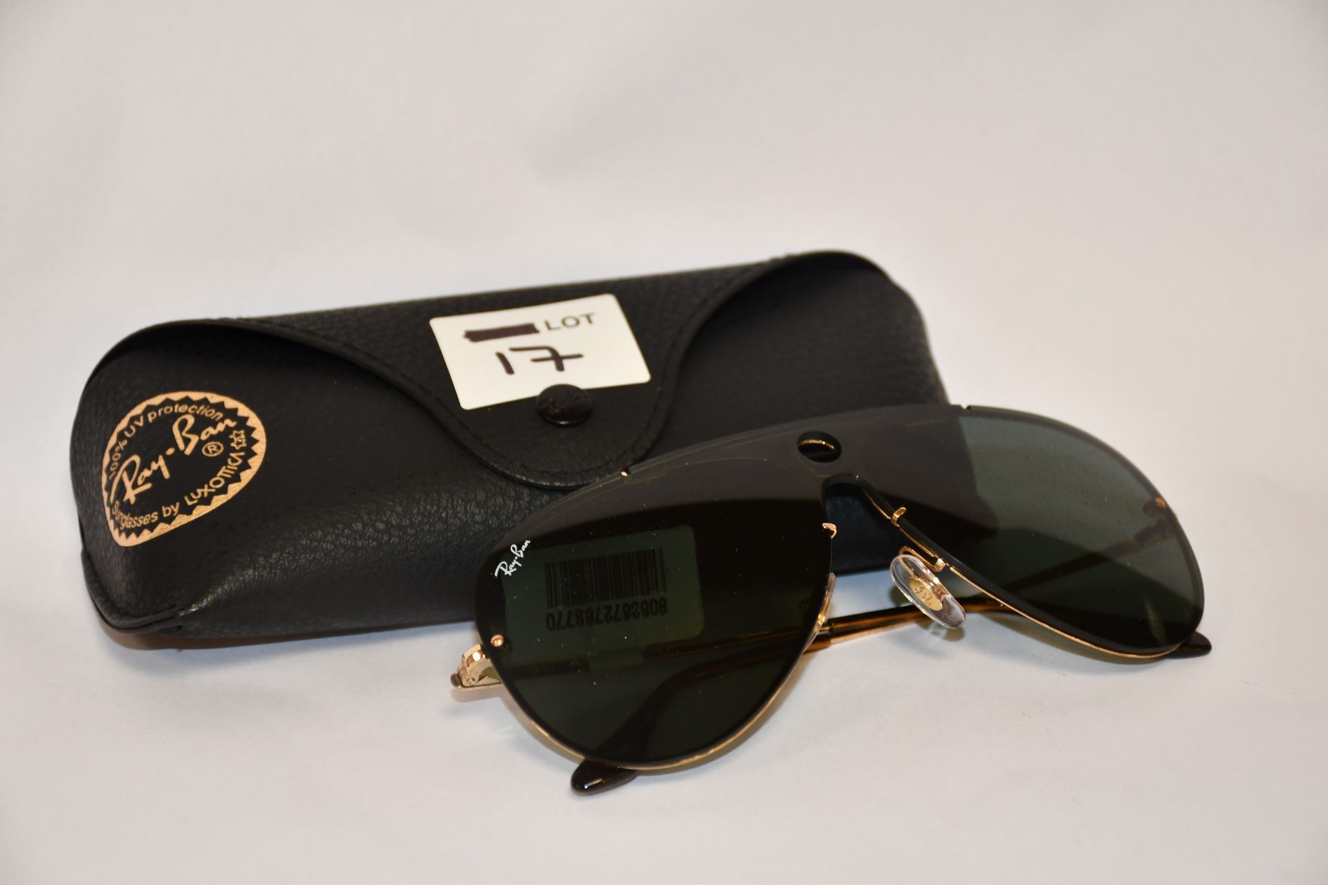 A pair of as new Ray Ban sunglasses.