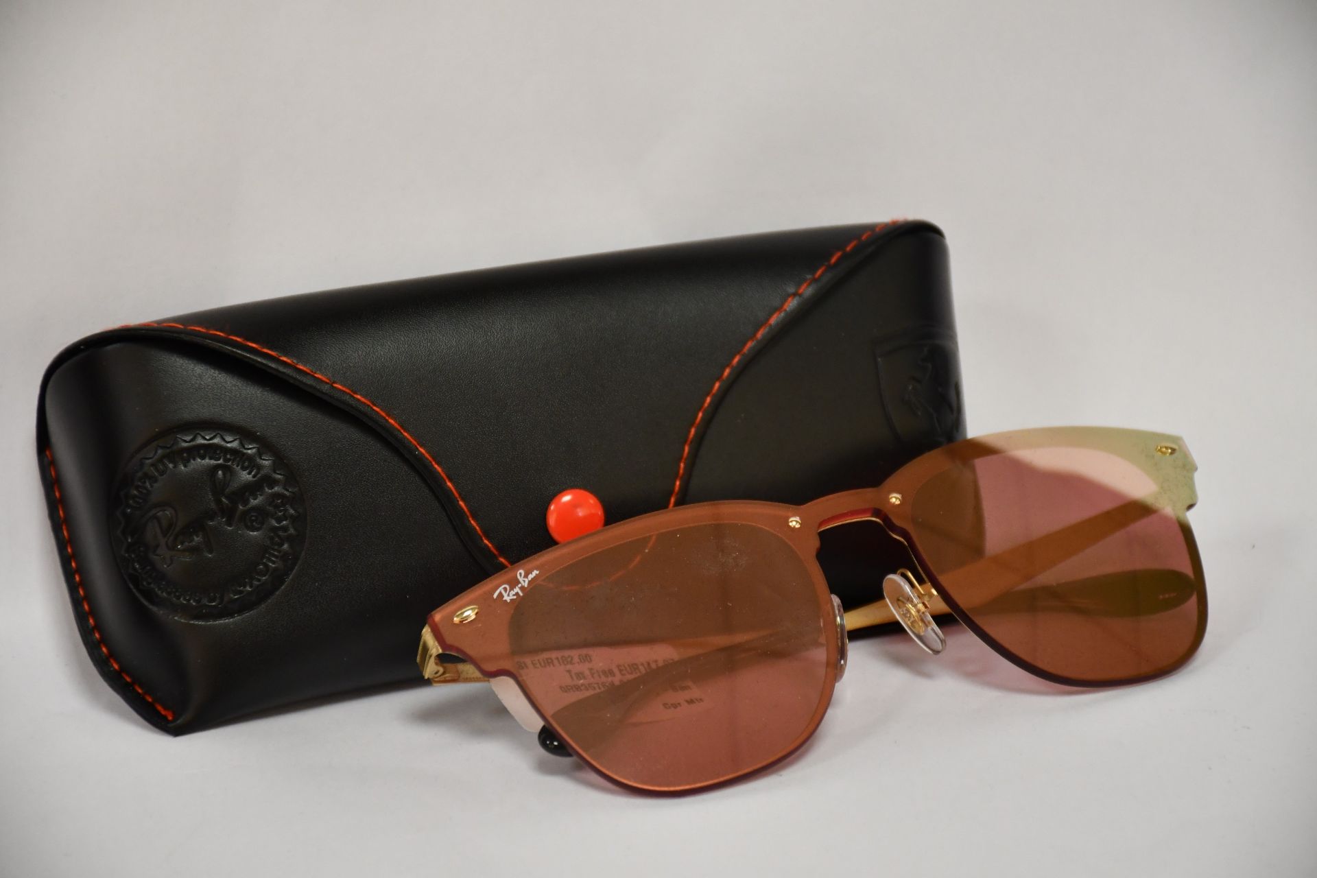 A pair of as new Ray Ban Ferrari RB4297M sunglasses.