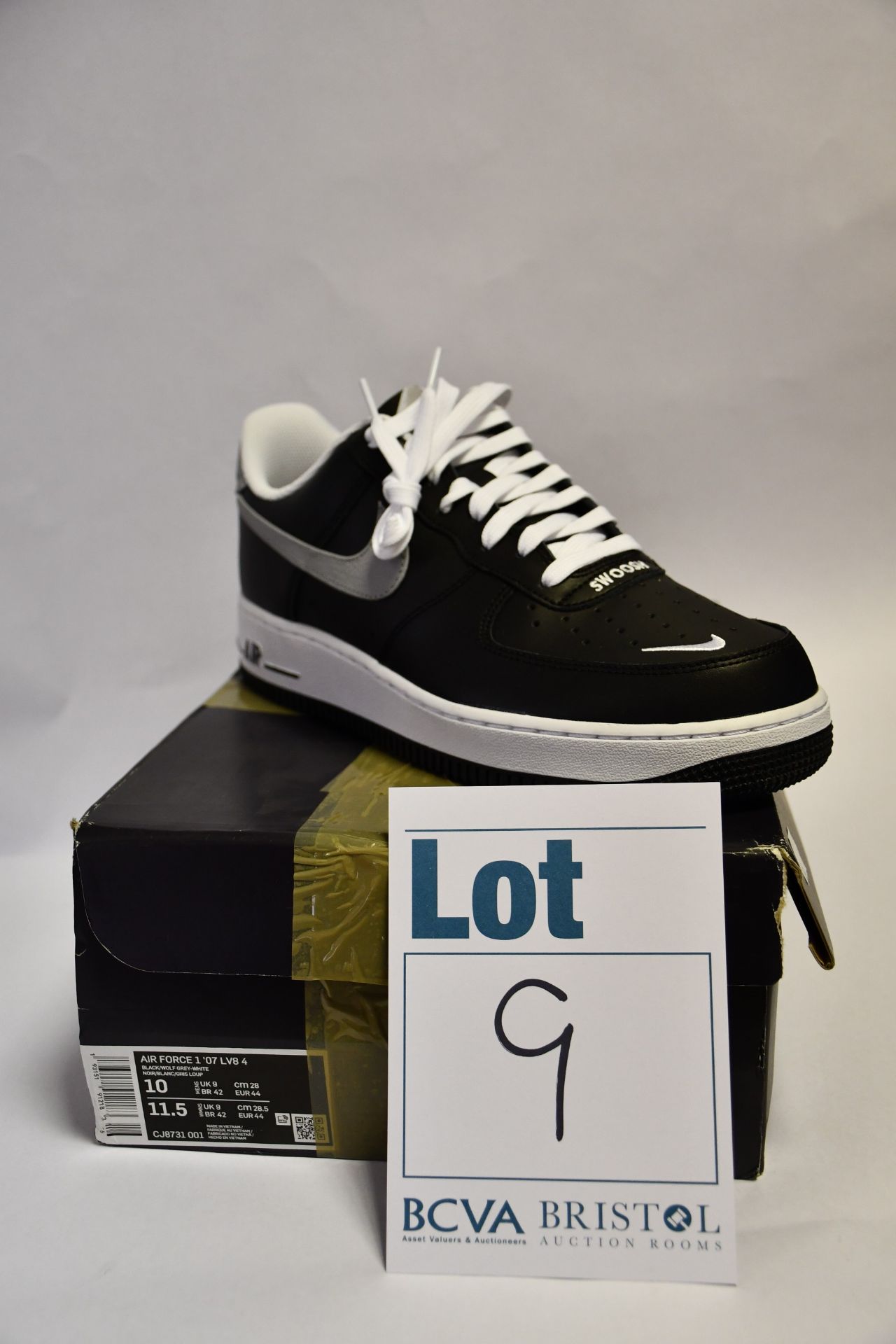 A pair of as new Nike Air Force 1 '07 LV8 4 trainers (UK 9).