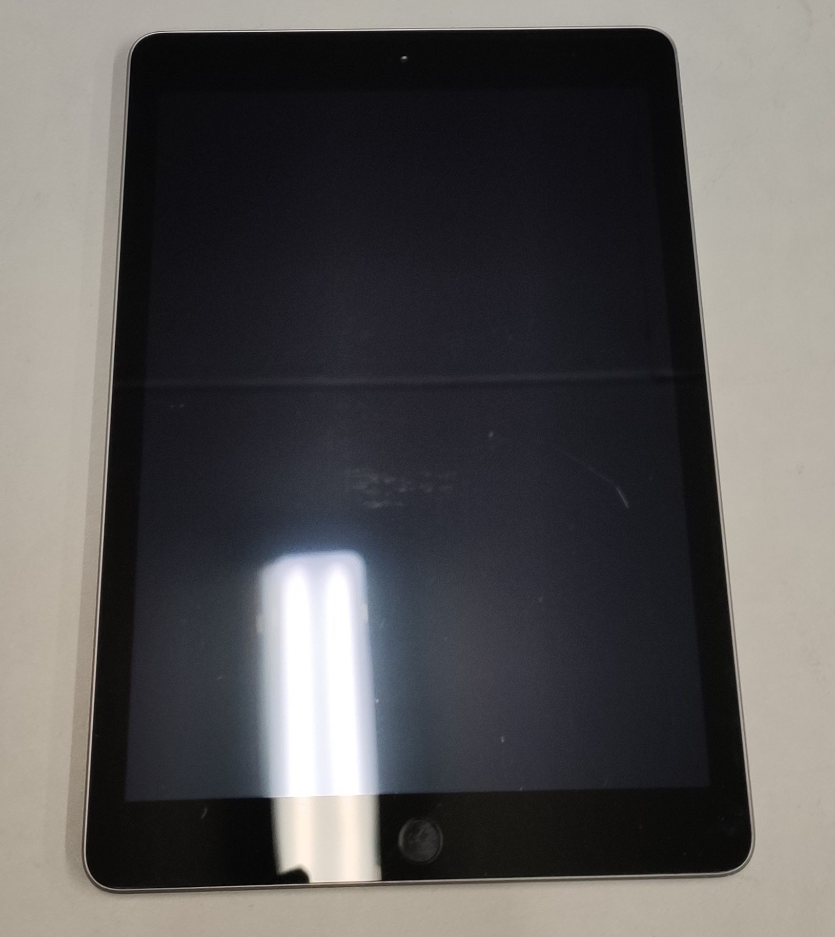 A pre-owned Apple iPad 9.7" 6th Gen (Wi-Fi/Cellular) 32GB in Space Grey (IMEI: 354880092221610) (