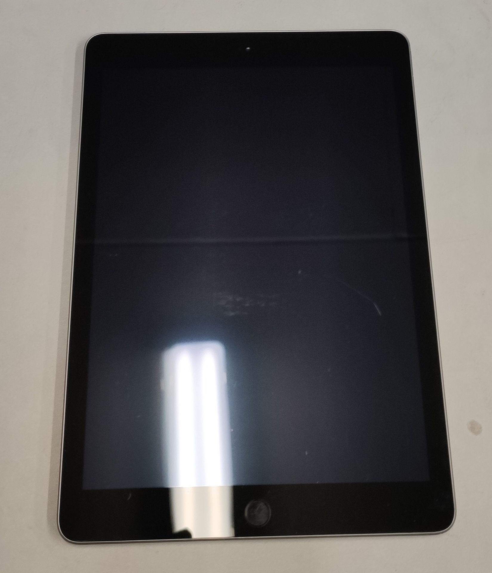 A pre-owned Apple iPad 9.7" 5th Gen (Wi-Fi Only) A1822 32GB in Space Grey (Serial: DMPTNGS3HLF9) (