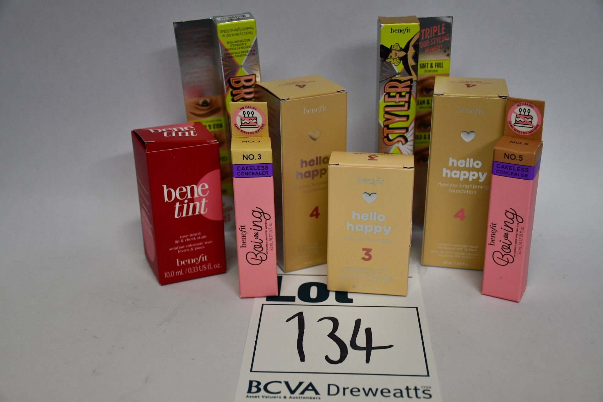 A quantity of various boxed as new Benefit cosmetics to include Hello Happy flawless brightening