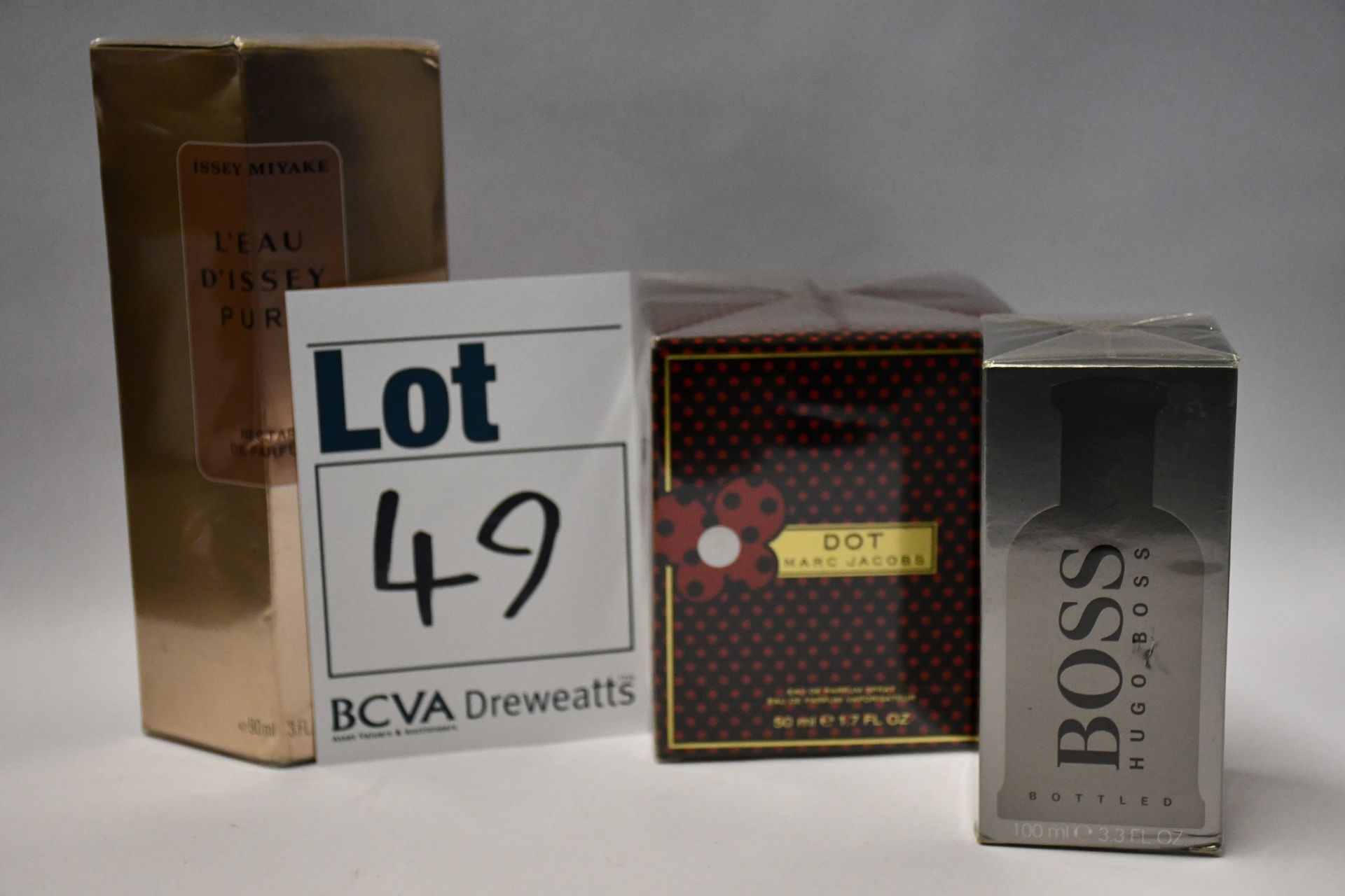 Two Marc Jacobs Dot eau de parfum (50ml), two Boss Bottled aftershave lotion (100ml) and one L'eau