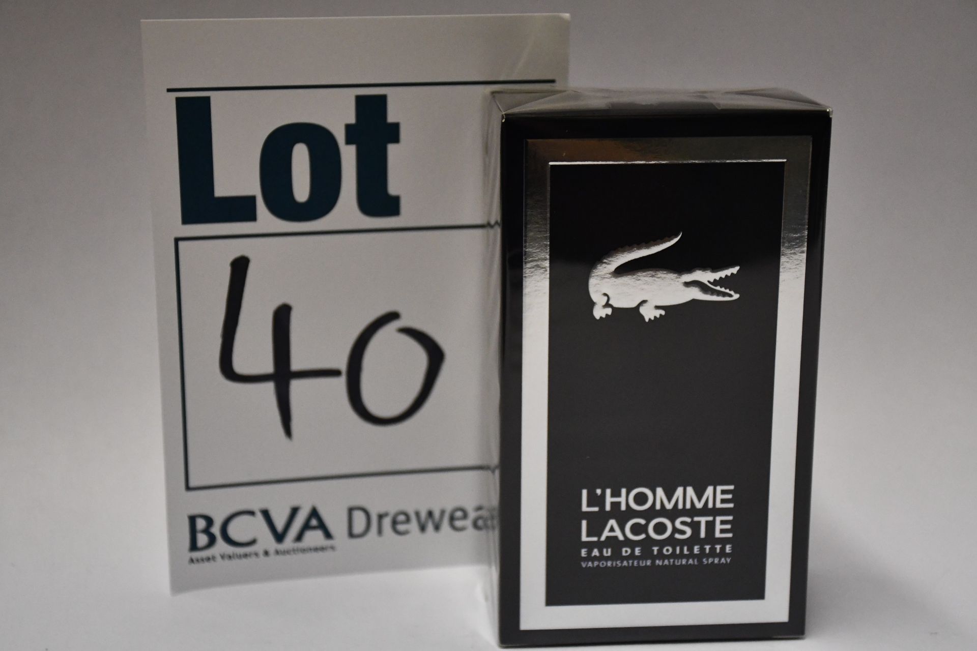 Three boxed as new Lacoste L'Homme Eau De Toilette Intense spray (100ml).