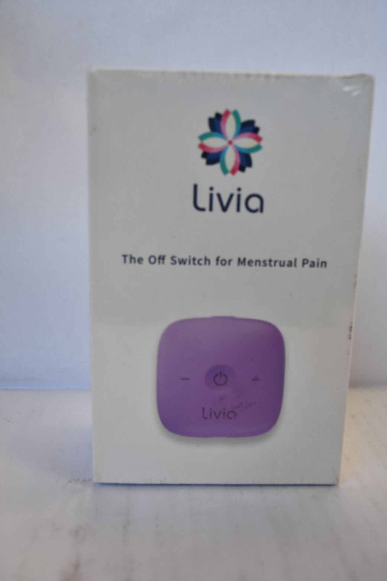 One boxed as new Livia - The Off Switch For Menstrual Pain (Instant treatment for period cramps), in