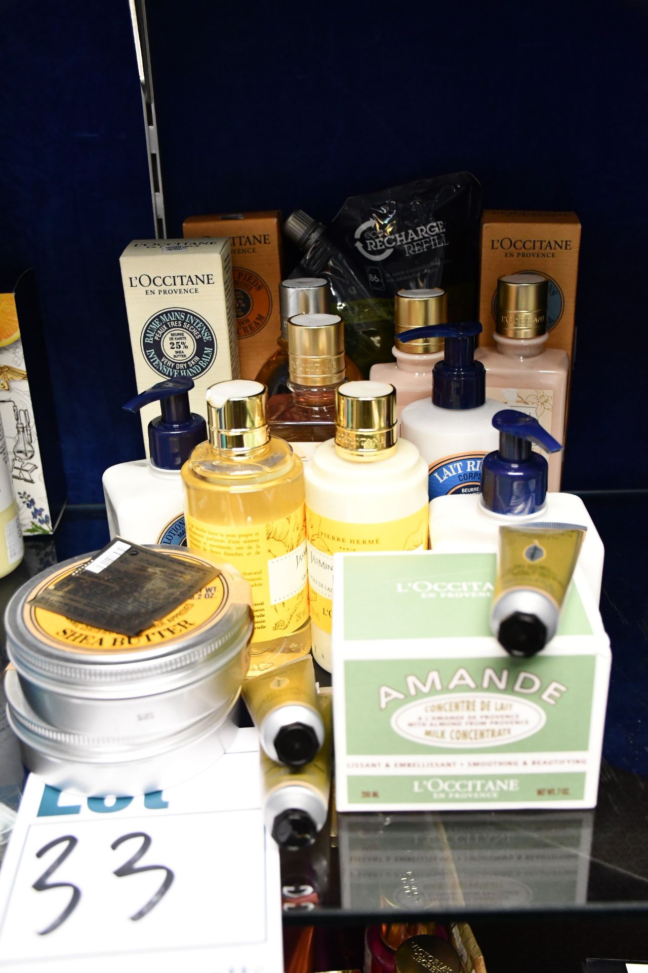 Nineteen assorted as ne L'Occitane products to include foot cream, hand cream, hand balm, milk