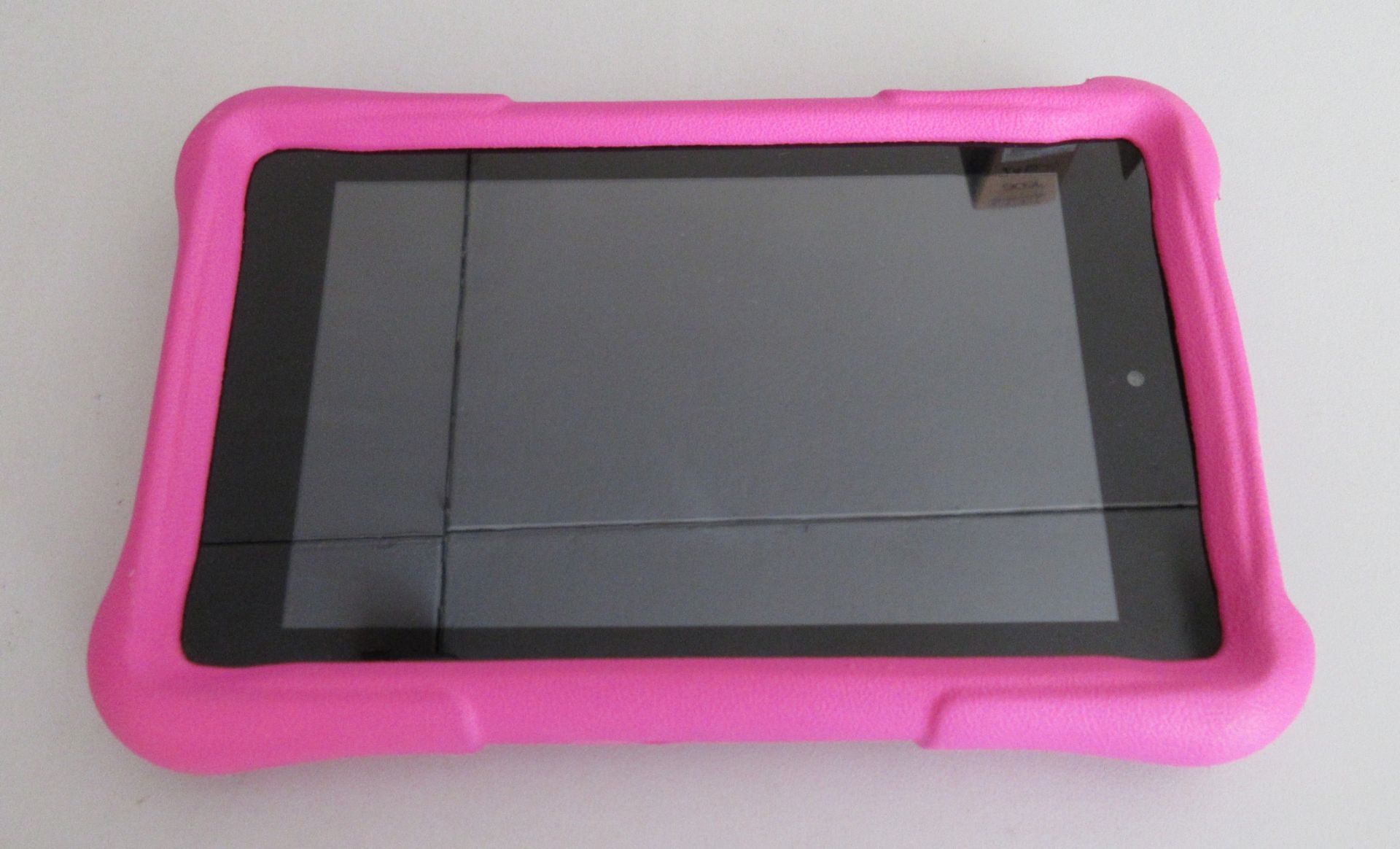 A used Kindle Fire HD 6 Inch 8gb Tablet PW98VM in Black. Pink rubber case. No cables or box or