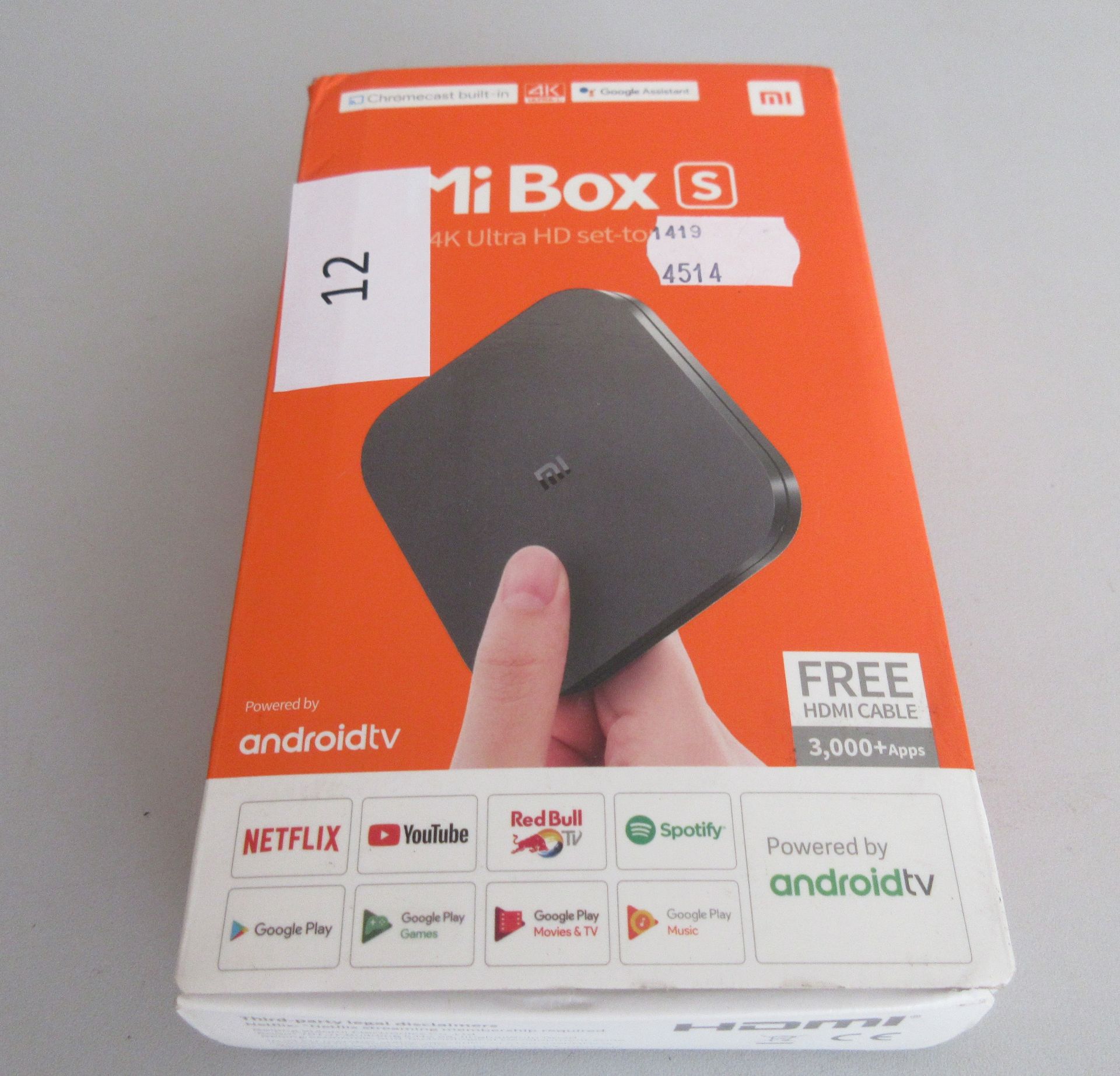 A used Xiaomi Mi Box S 4K UHD Set Top Box. Untested item. Sold for spares or repair. Remote and