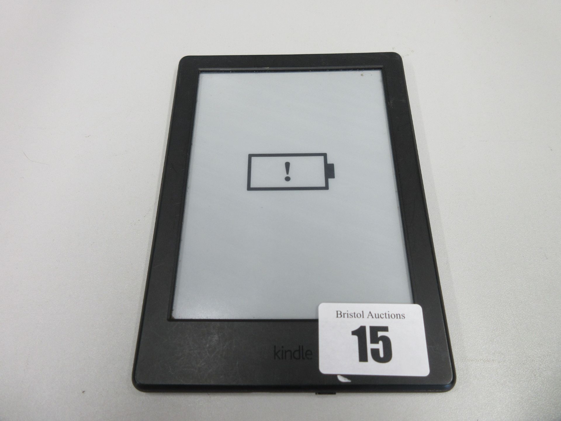 A pre-owned Amazon Kindle (SY69JL) E-Reader in Black.