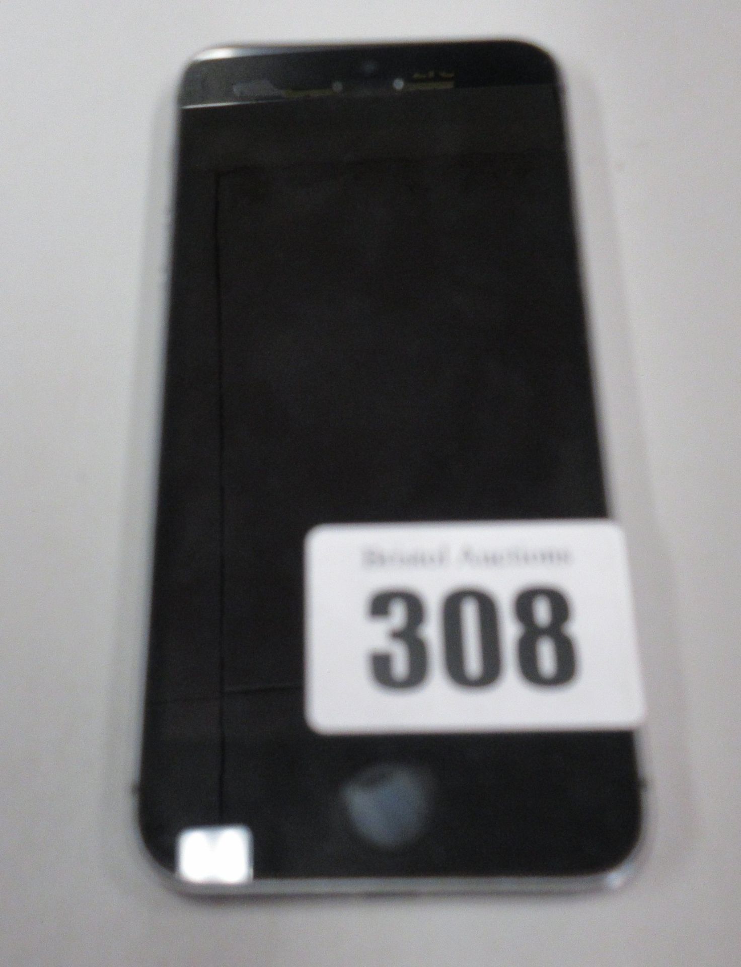 A used iPhone 5S A1457 in Silver. Activation locked. Sold for spare or repair. IMEI number