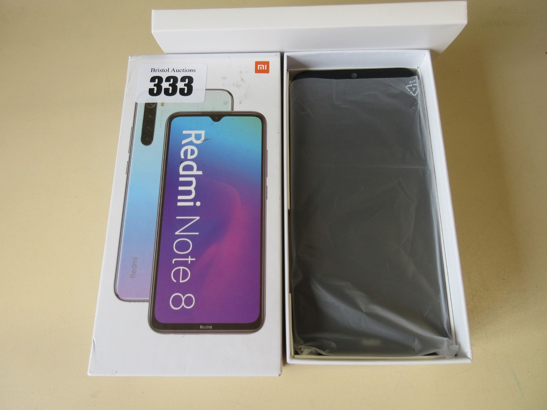 A used Redmi Note 8 4GB 64GB Android Smartphone in Space Black. Good condition. Boxed with case