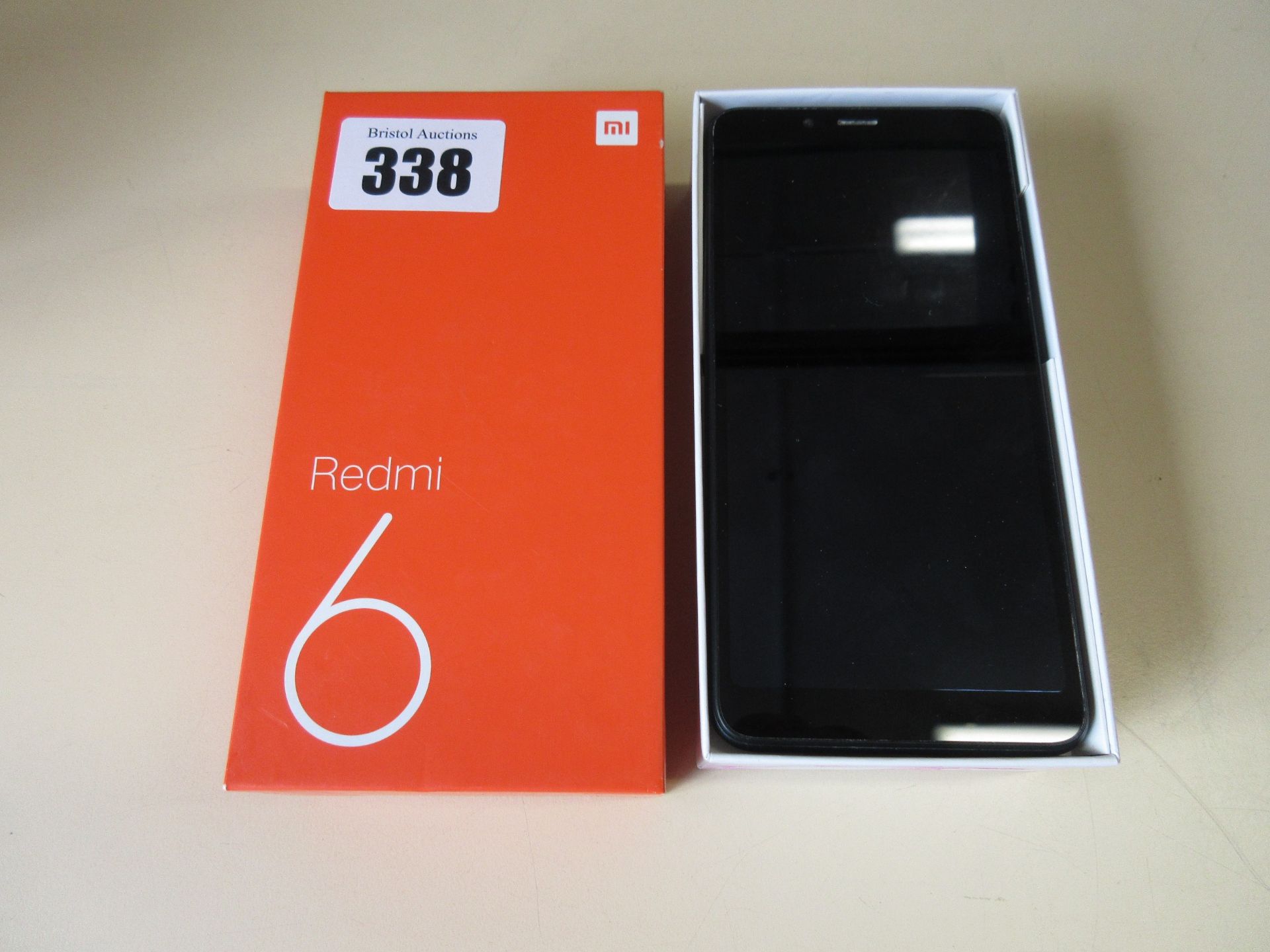 A used Redmi 6 3GB 64GB Android Smartphone in Black. Global version. Boxed with no accessories.