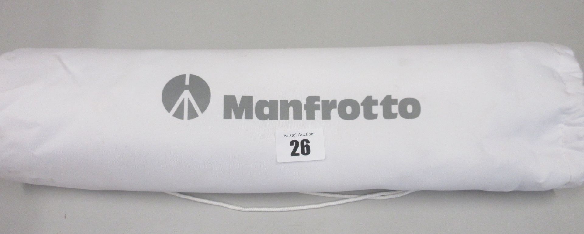 A pre-owned Manfrotto Compact Light Aluminum Tripod in White with carry bag.