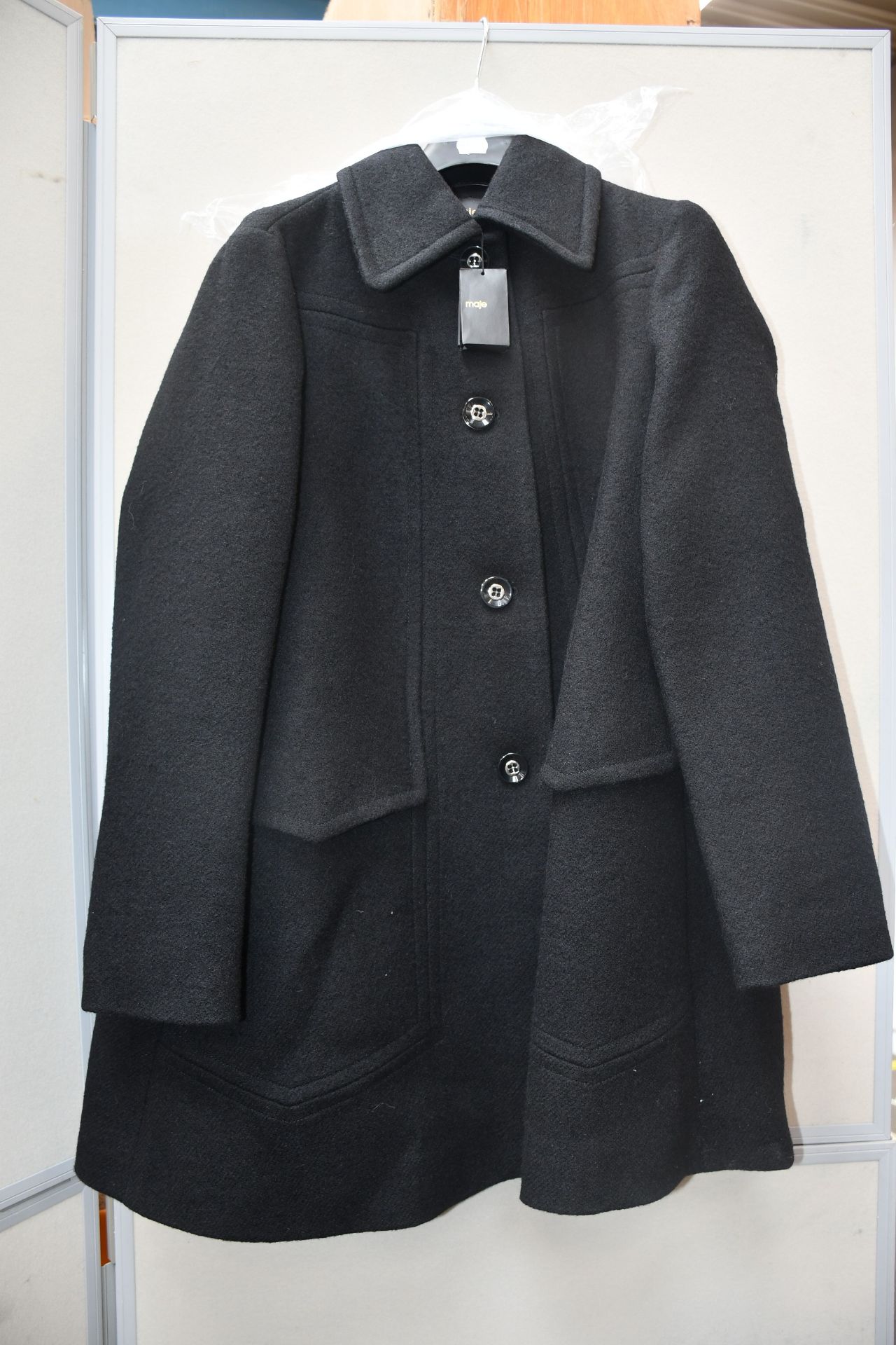 An as new Maje coat in black (T38 - RRP £450).