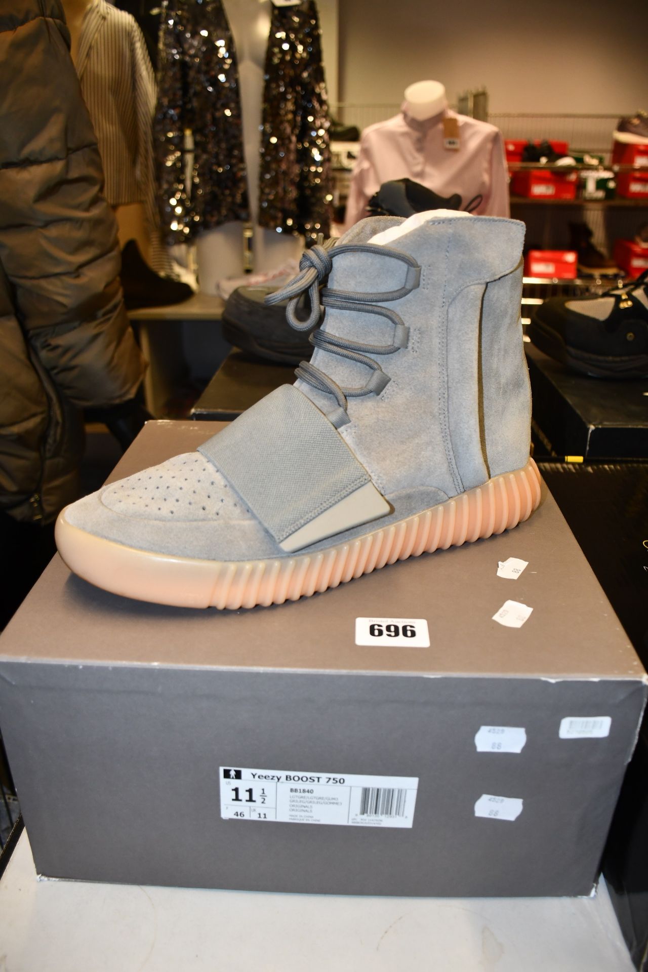 A pair of pre-owned Adidas Yeezy Boost 750 (Very slight signs of wear, excellent condition - UK