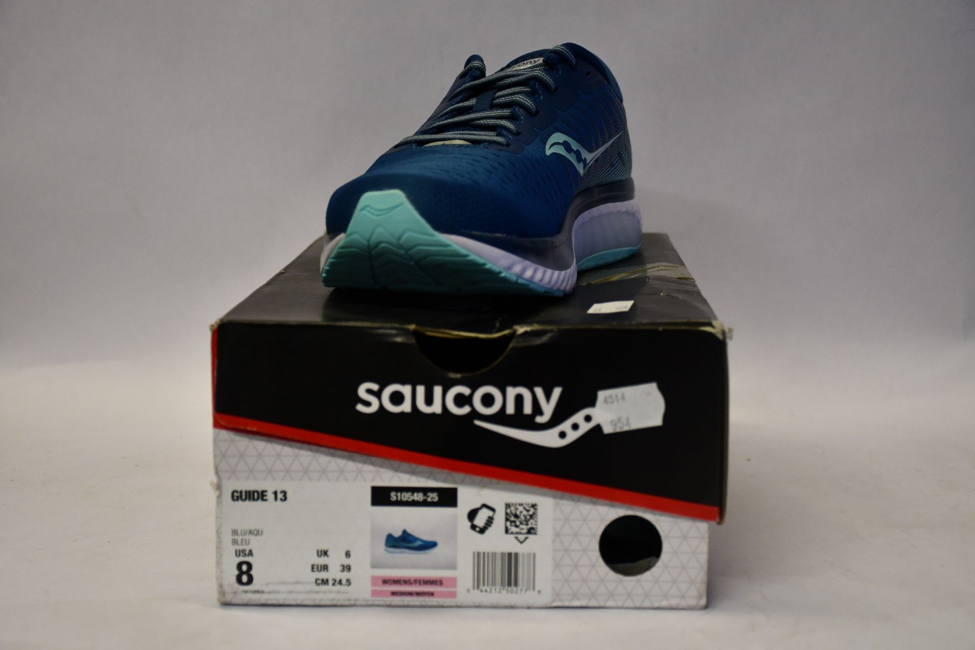 A pair of as new Saucony Guide 13 running shoes (UK 6).