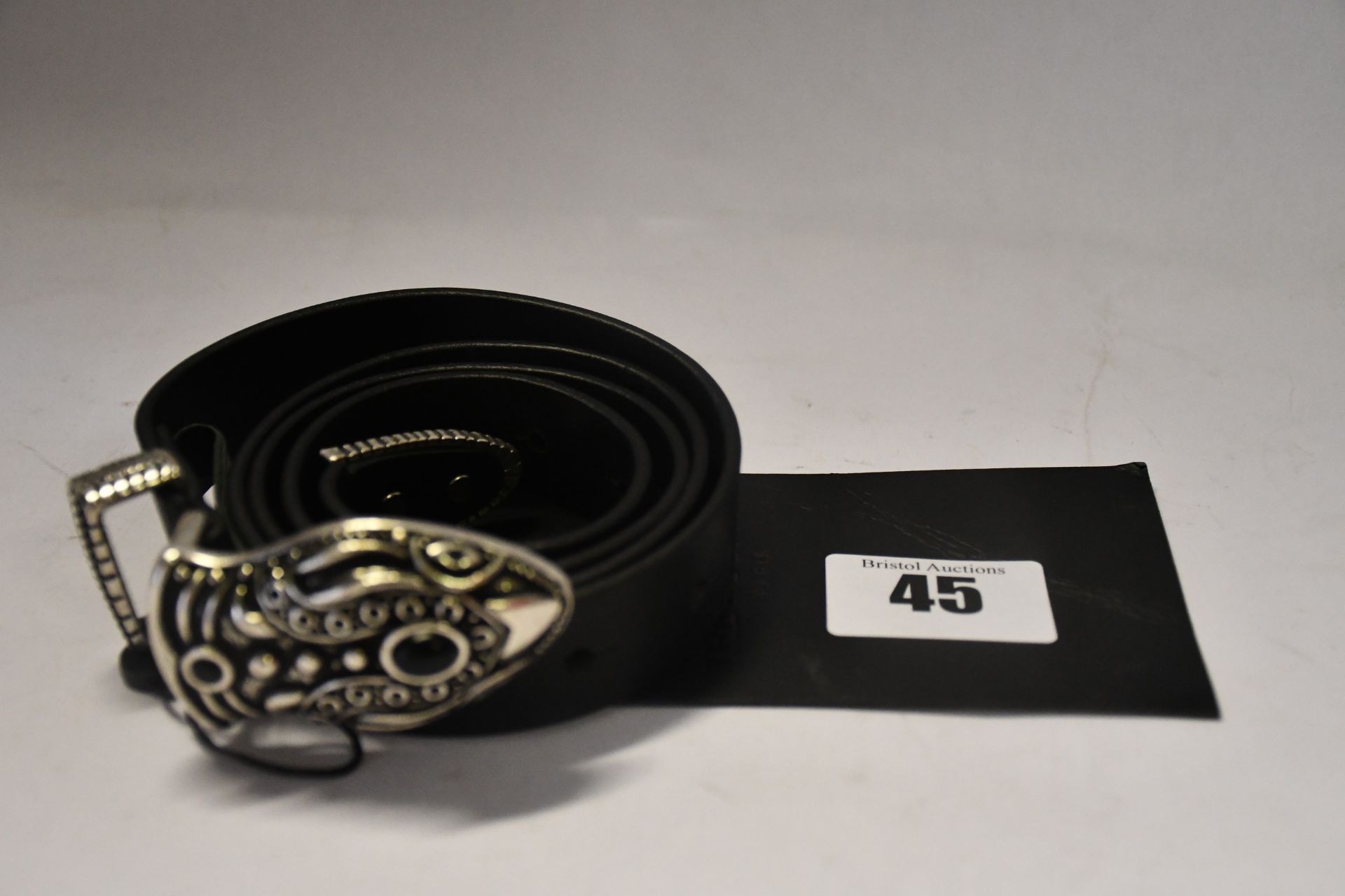 An as new The Kooples leather belt with snake head (RRP £135).