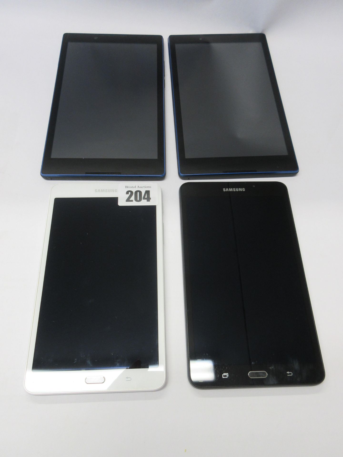 Four pre-owned Android tablets sold for parts; two Samsung Galaxy Tab A SM-T280 72 and two Lenovo