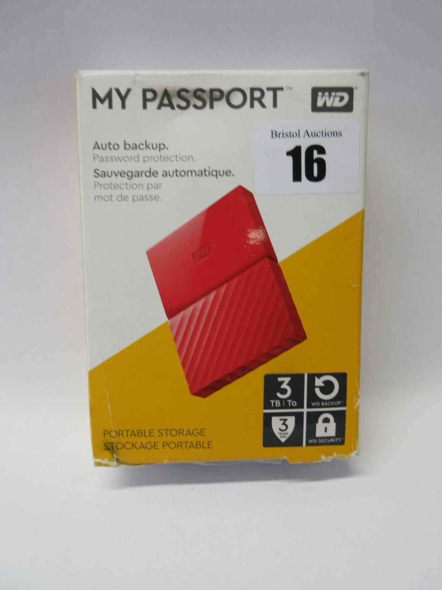 A boxed as new WD My Passport 3TB Portable Hard Drive in Red (Box opened, some cosmetic damage to