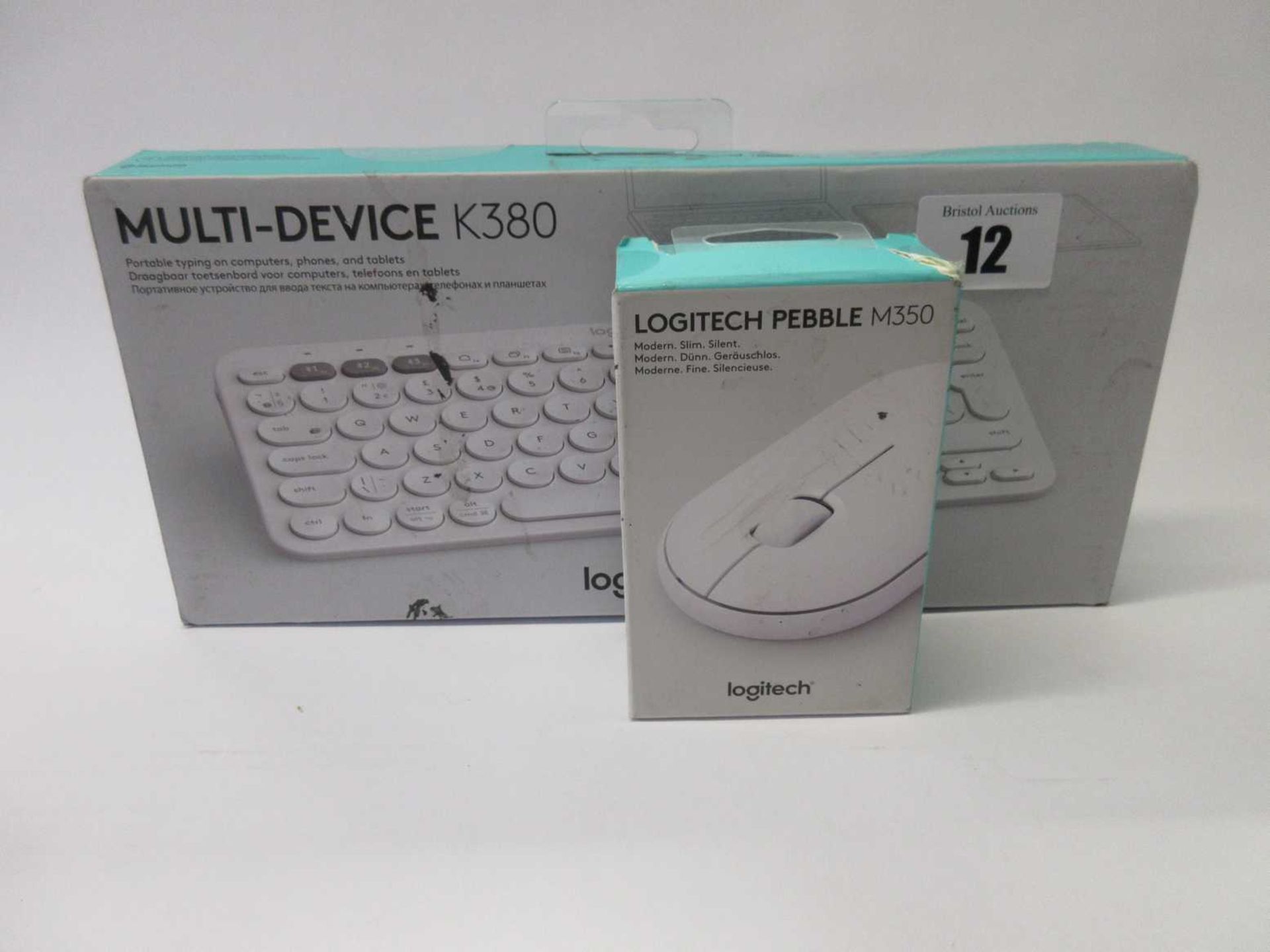 A boxed as new Logitech K380 Multi-Device Bluetooth Keyboard in White and a boxed as new Logitech