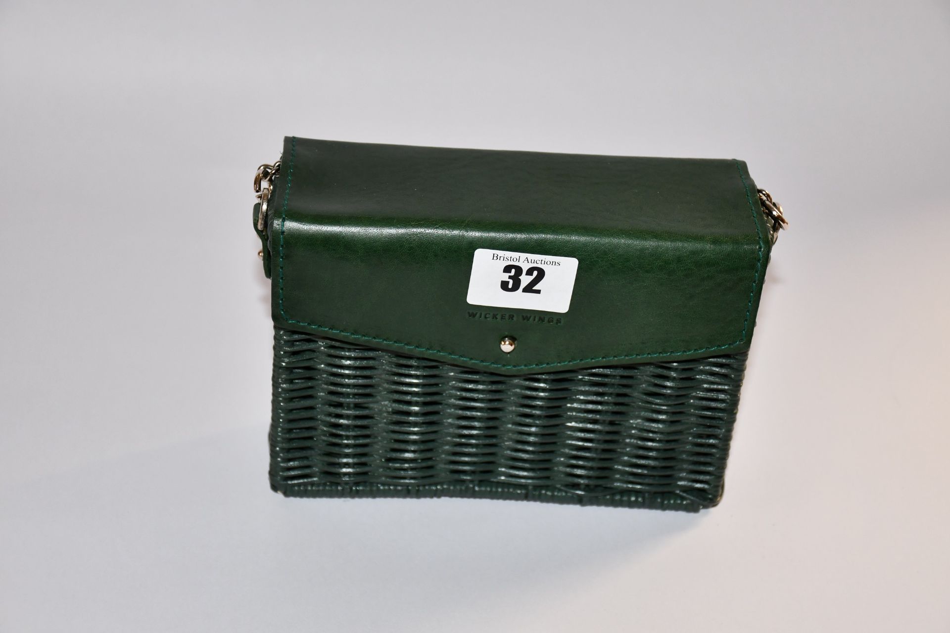 An as new Wicker Wings minis shoulder bag in green.