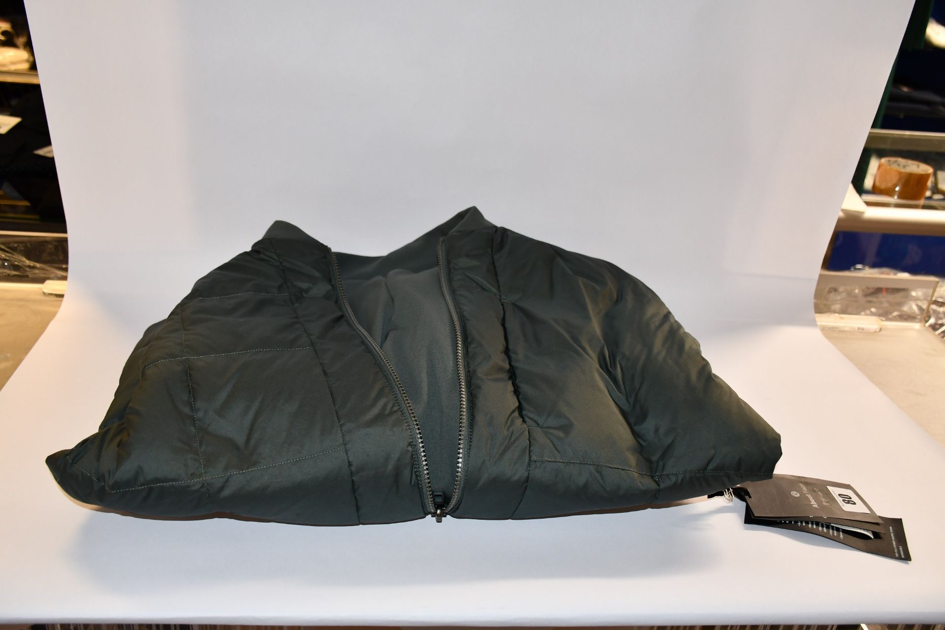 An as new About Face bomber jacket (XL - RRP £158).