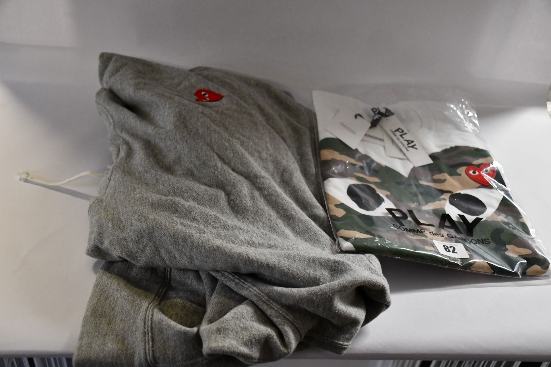 An as new Play Commes des Garcons T-shirt (M) and hoodie (L).