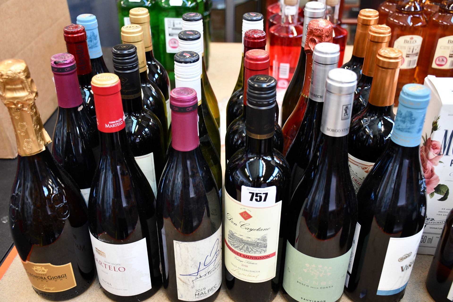 A quantity of assorted wines and related items (Approximately 20 bottles).