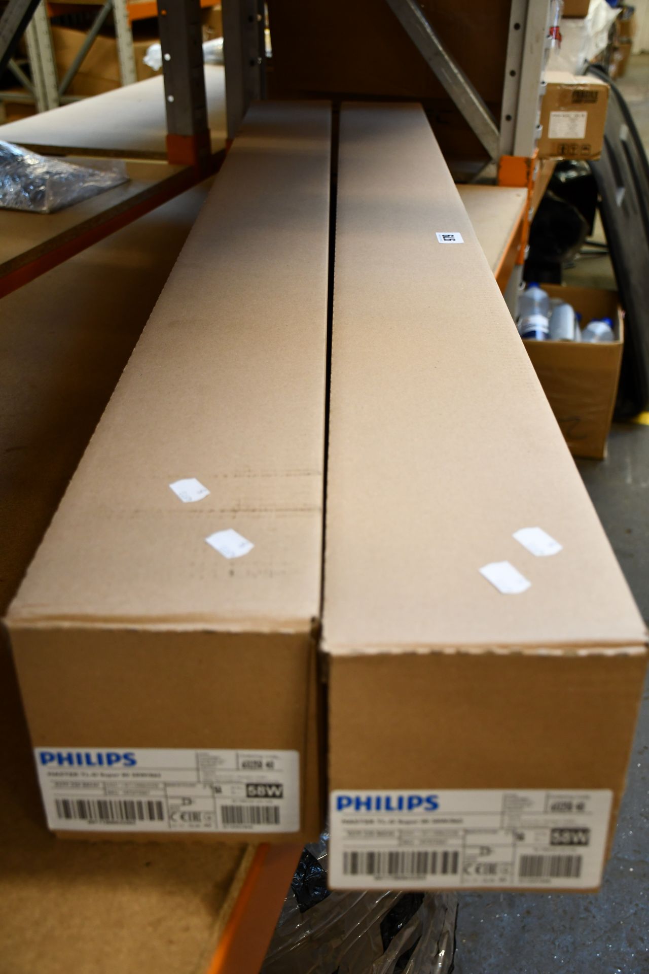 Two boxes of Philips master tl-d super 80 58w light bulbs (25 in a box).