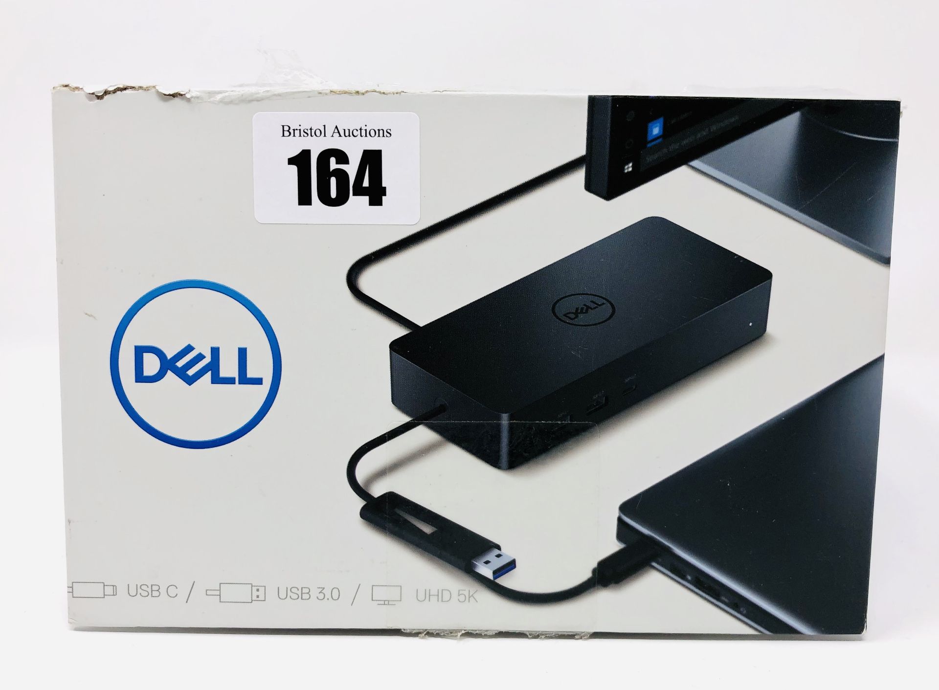 A pre-owned Dell D6000 Universal Dock in original box (Require UK plug adapter).