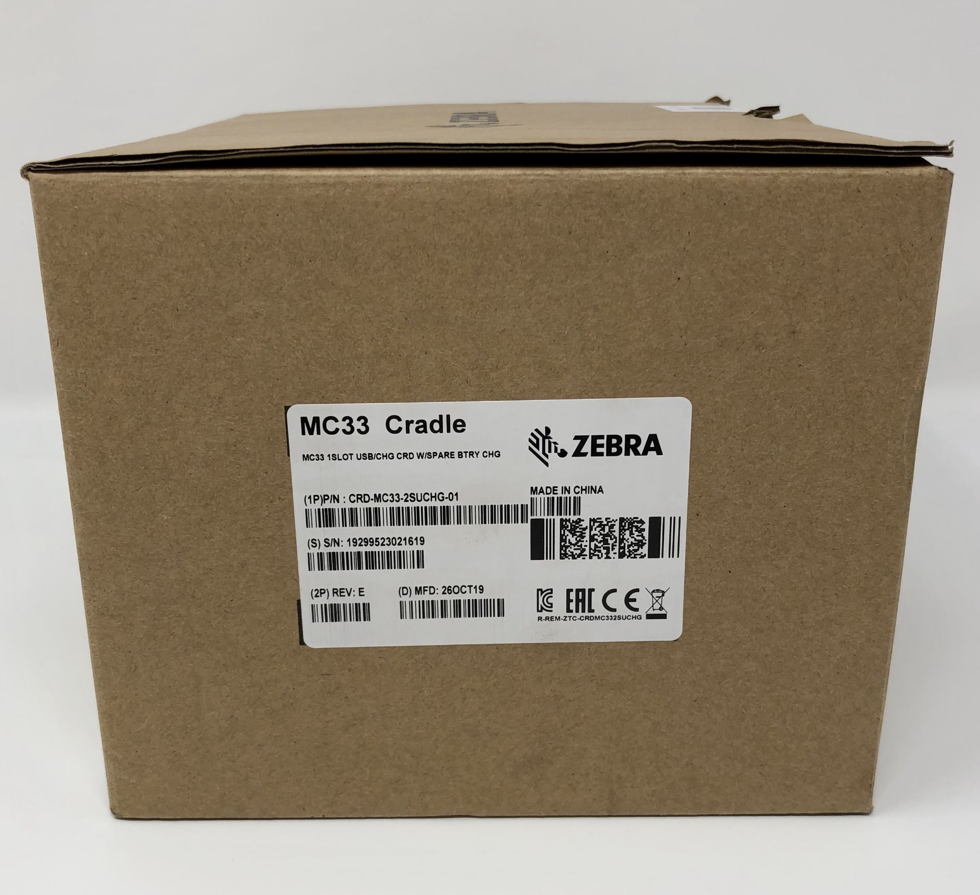 A boxed as new Zebra MC33 Single Slot USB Charging Cradle (Model: CRD-MC33-2SUCHG-01).