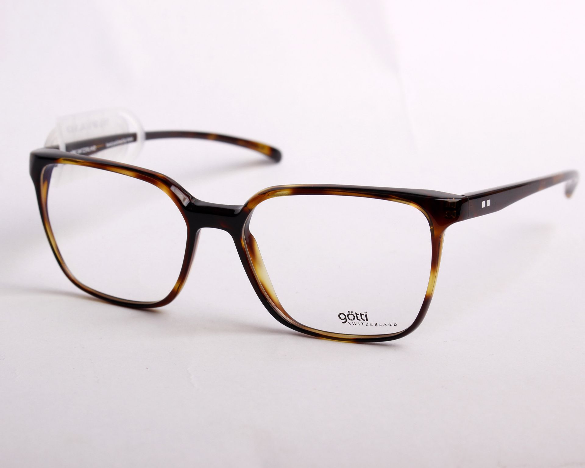 A pair of as new Gotti glass frames with clear glass (RRP £300).