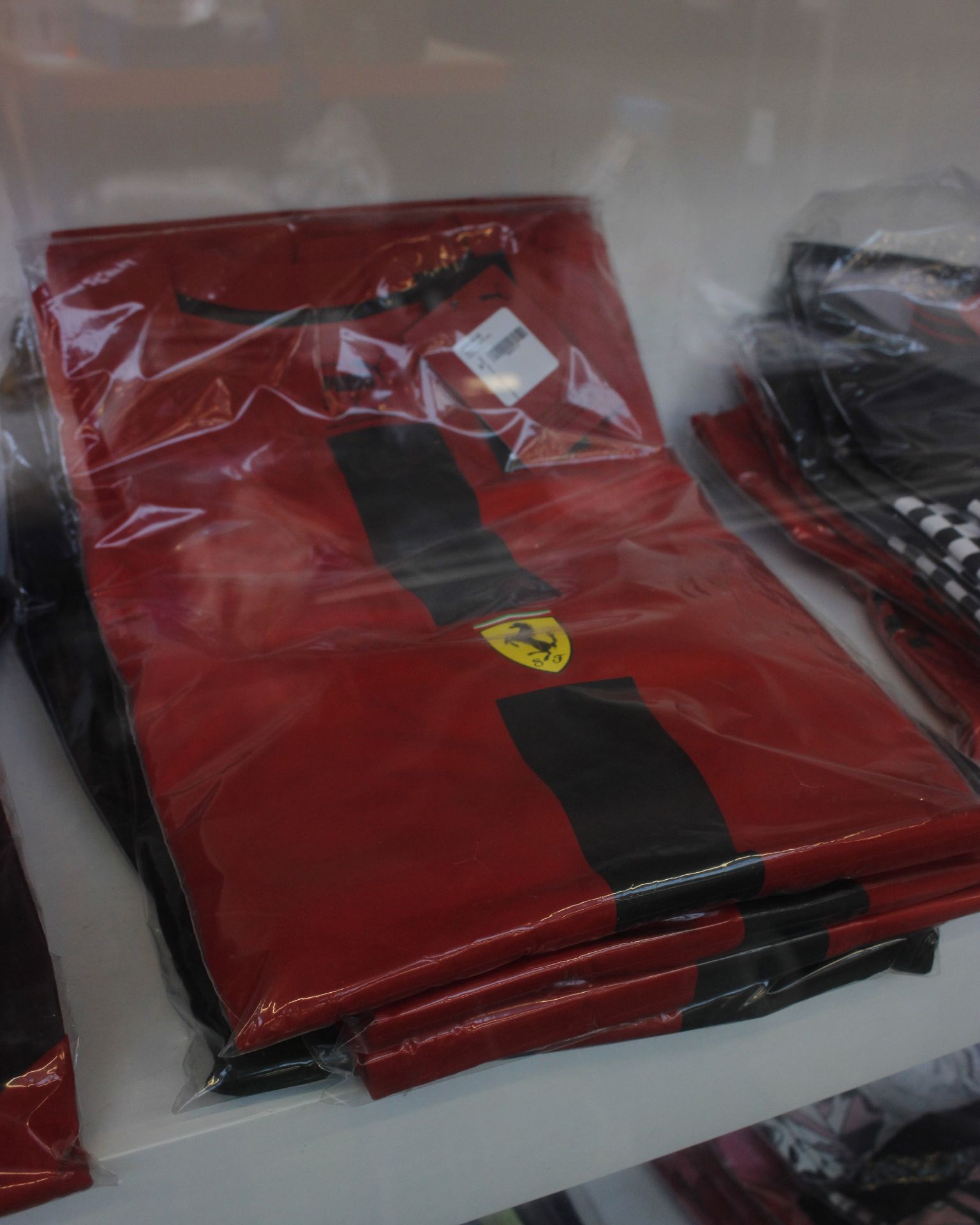 Eight as new Puma replica Ferrari Race XTG t-shirts (M, 4 x red, 4 x black).