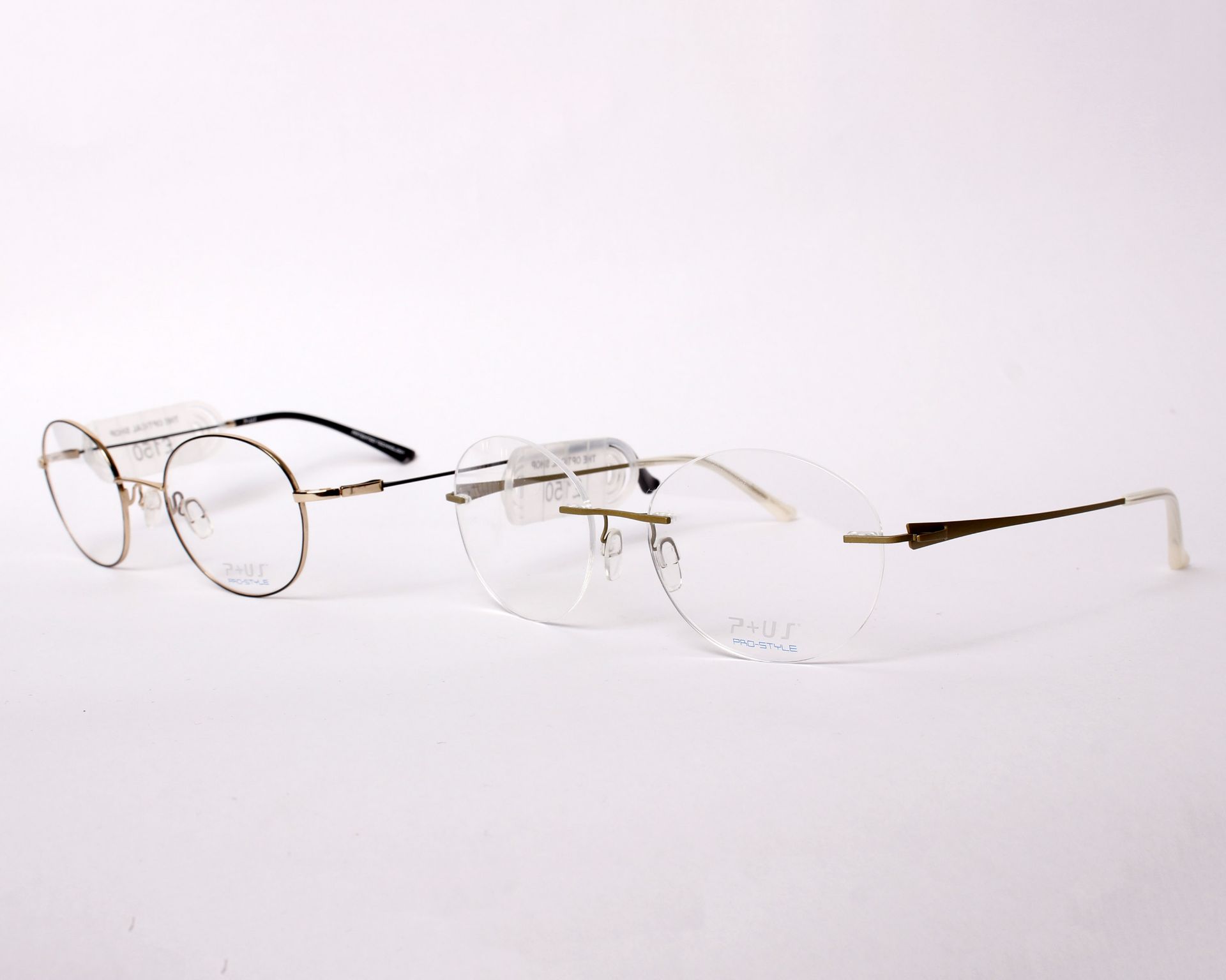 Two pairs of as new P+US Pro Style glasses frames with clear glass (RRP £150 each).
