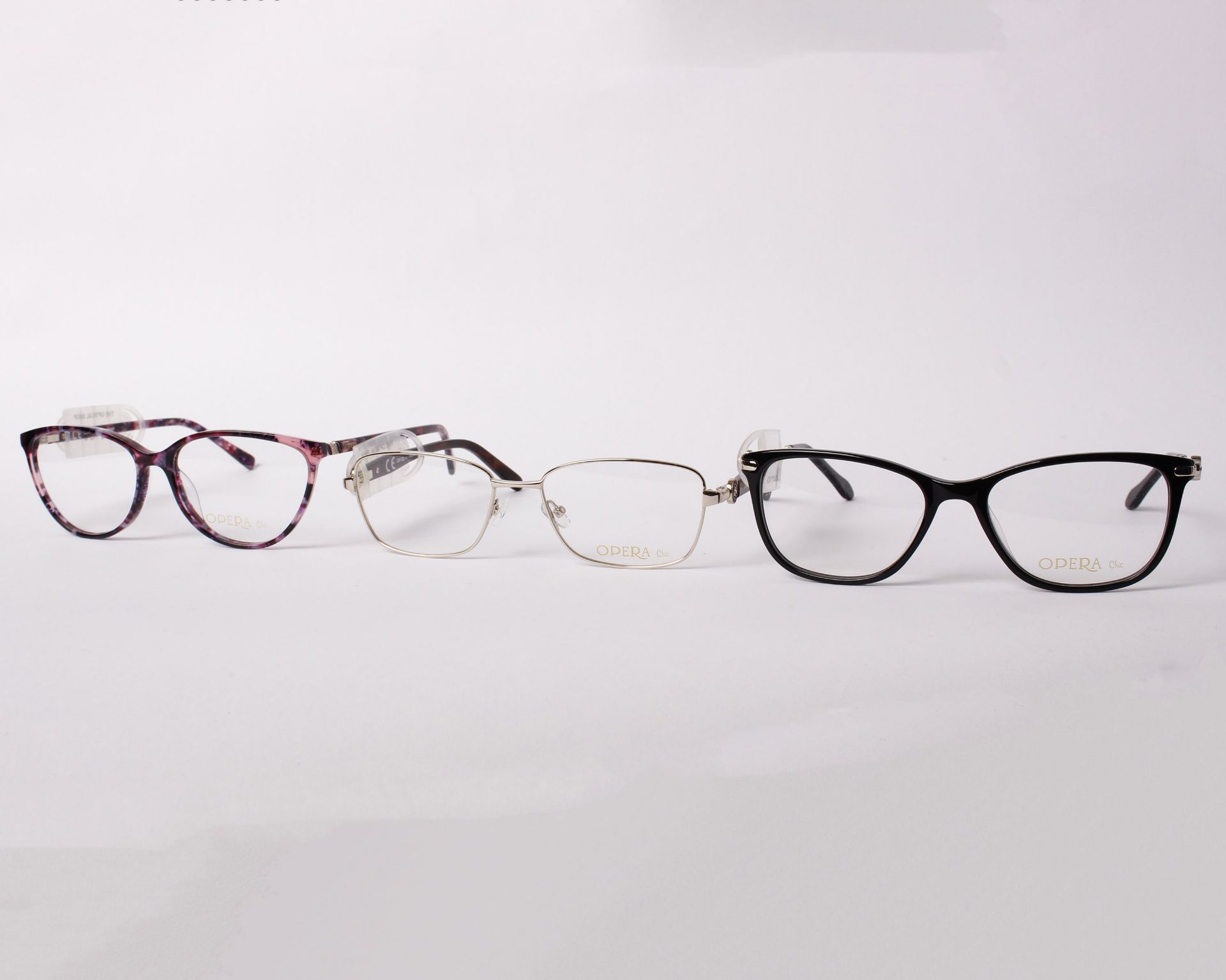 Three pairs of as new Opera glasses frames with clear glass (RRP £110 and £130).