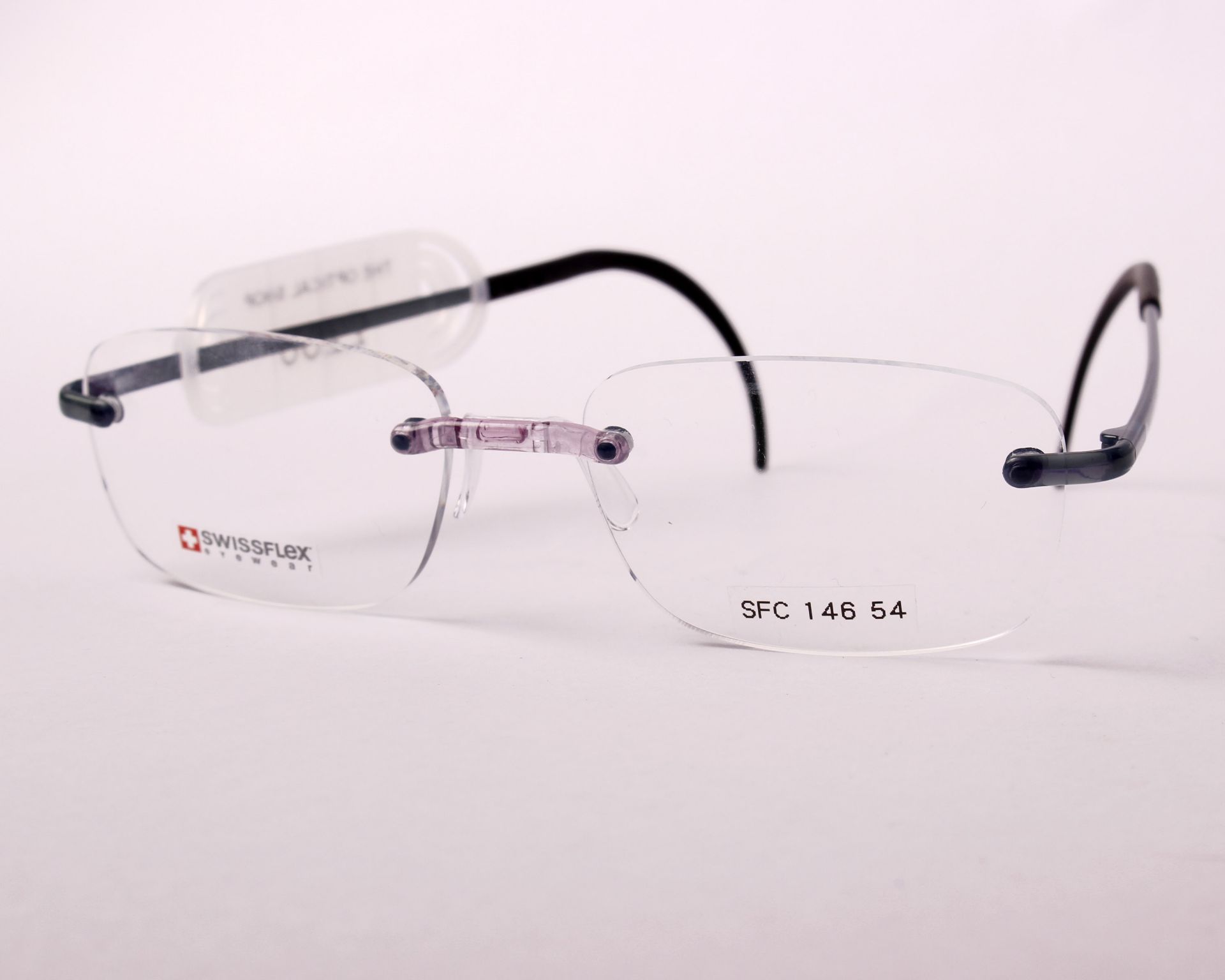 A pair of as new SwissFlex glasses frames with clear glass (RRP £200).