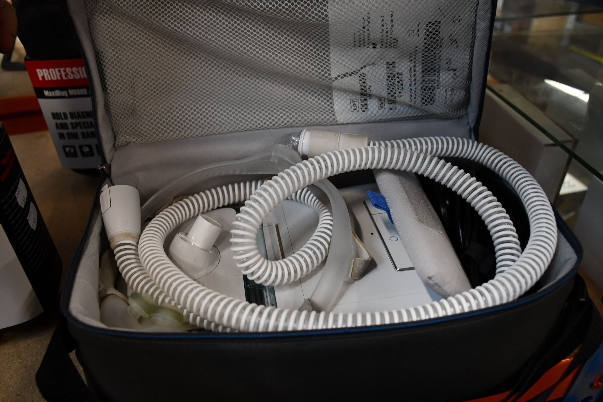 A pre-owned Philips Respironics with carry case.