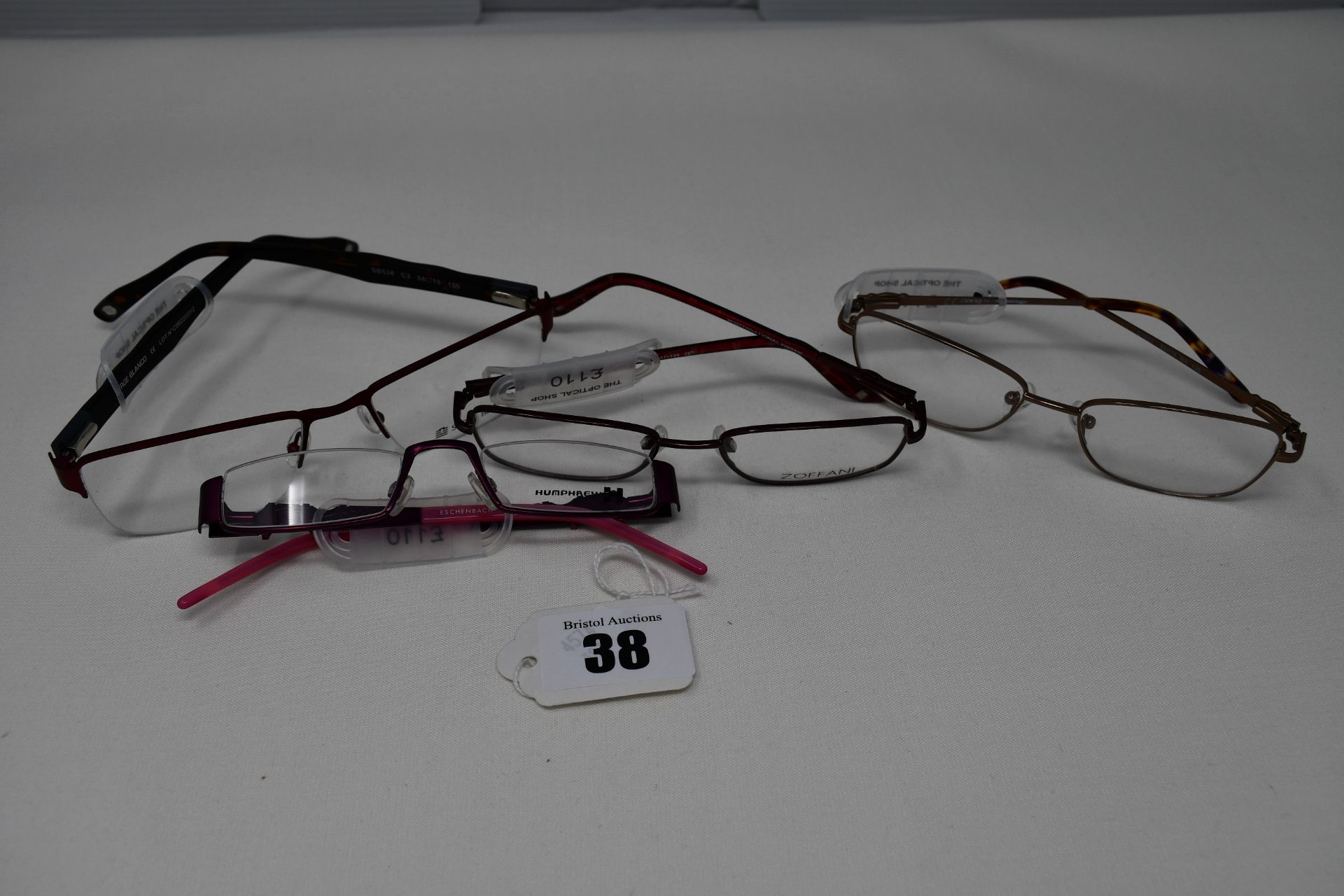 Four pairs of as new glasses frames with clear glass; Serge Blanco, Opera, Humphrey's and Zoffani (