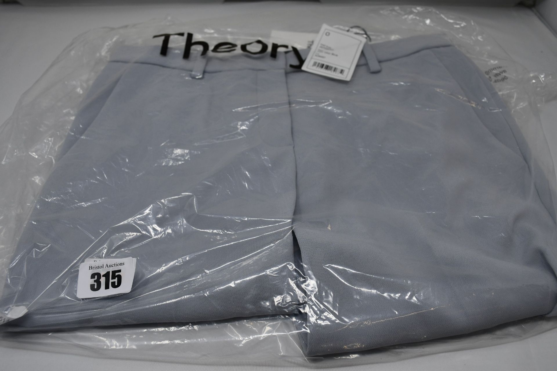 A pair of as new Theory Treeca cropped trousers in mist blue (Size 0 - RRP $295).