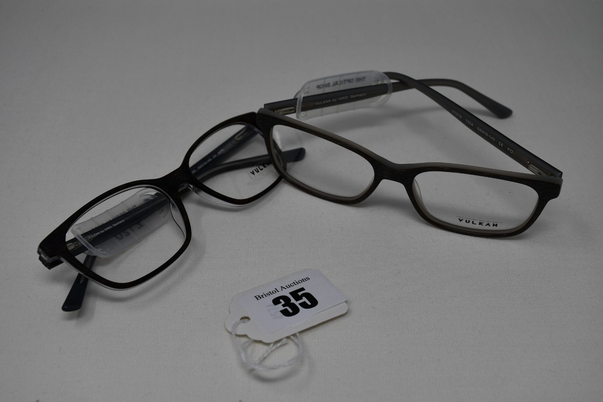 Two pairs of as new Vulkan glass frames with clear glass (RRP £120 each).