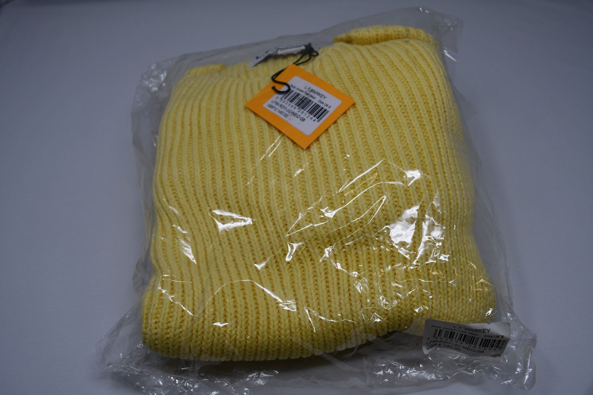 Two as new L.F.Markey Rudy jumpers in lemon (UK 10 and 12).