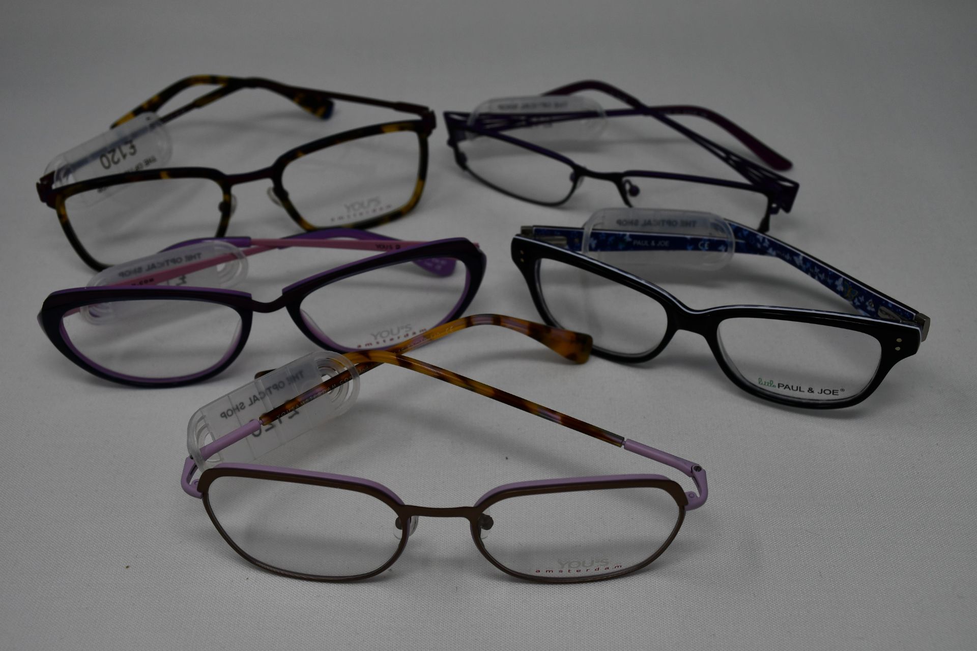 Five pairs of as new glasses frames with clear glass to include Yous, Paul & Joe and Maggy Rouff (