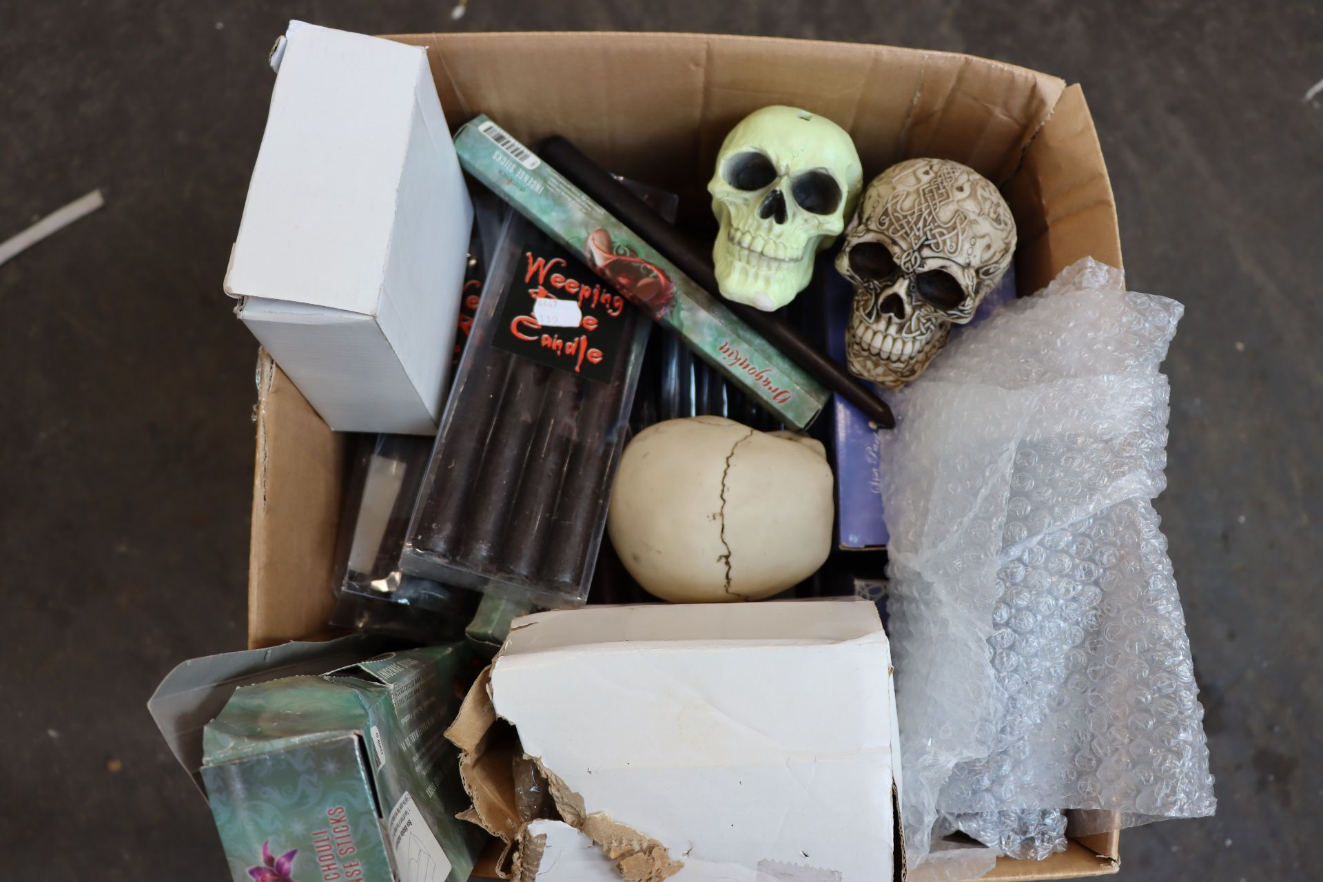 One box containing gothic style novelty items to include Weeping Rose Candles, Lisa Parker