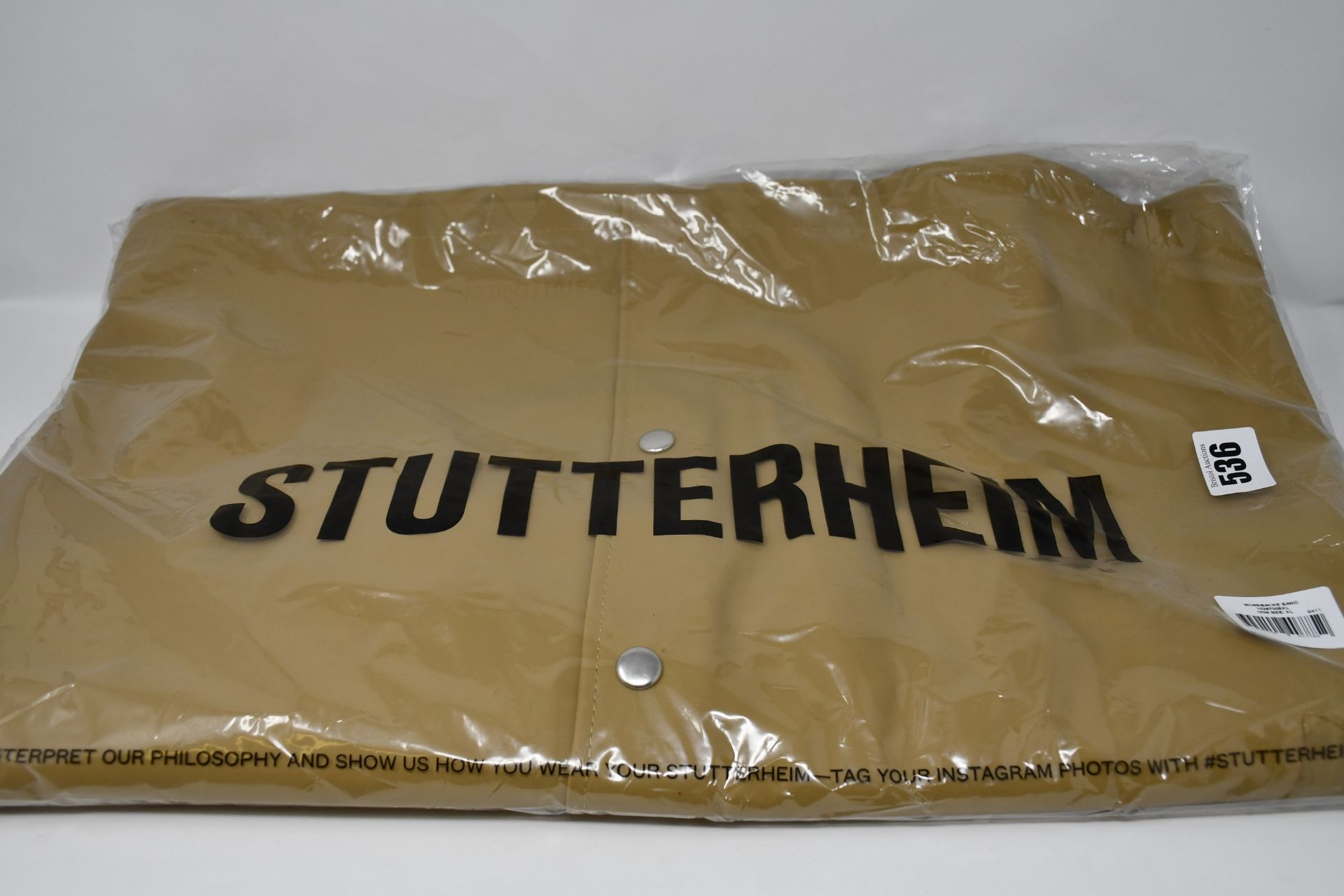 A women's as new Stutterheim Mosebacke raincoat (XL - RRP £180).