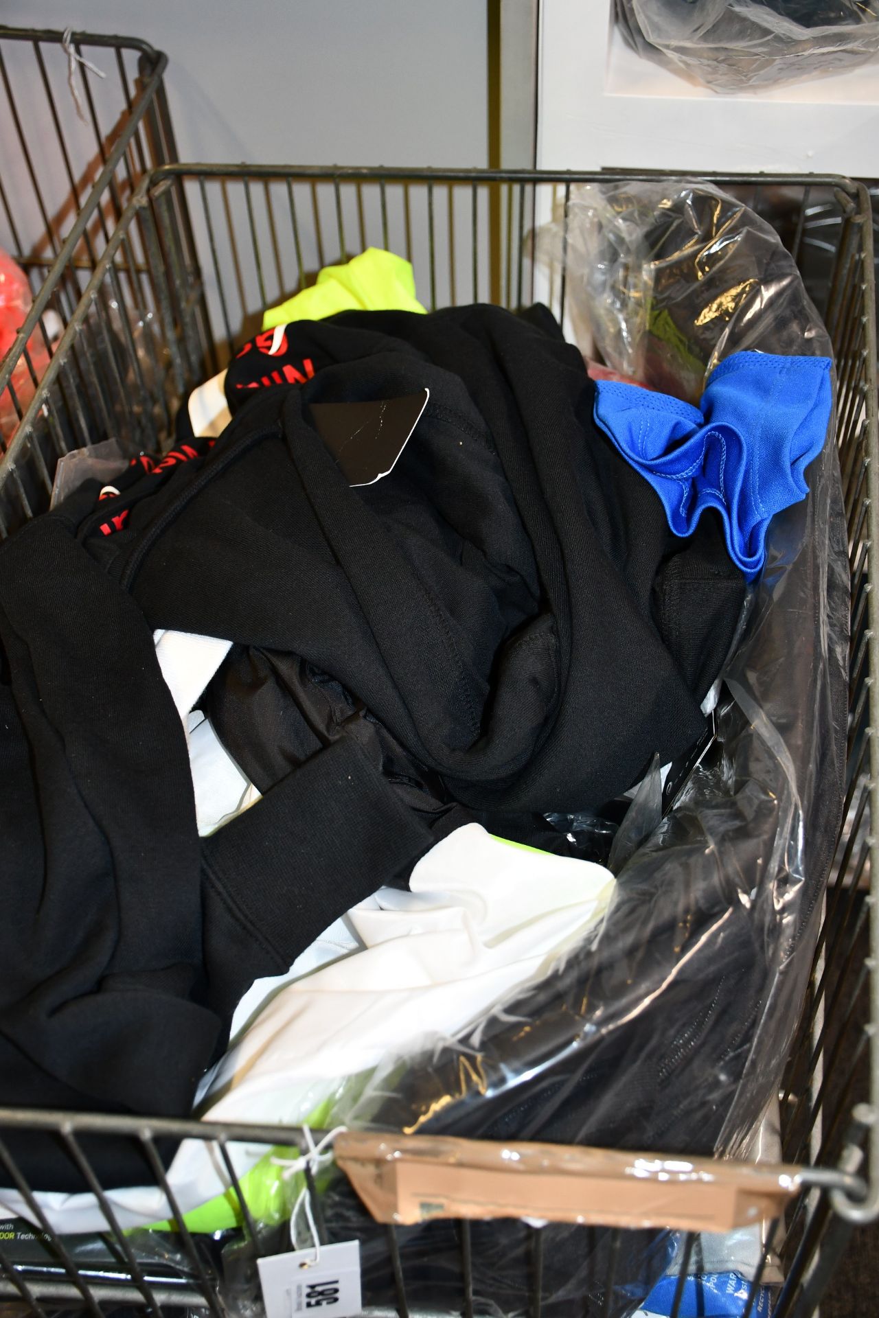 A quantity of as new Nike and Puma sportswear and accessories.