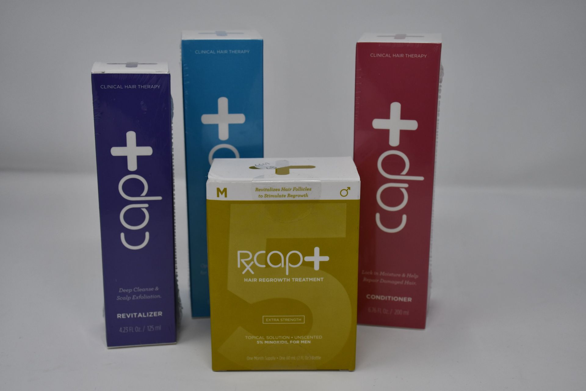 A quantity of boxed as new Capillus cap+ clinical hair treatment to include shampoo (200ml),