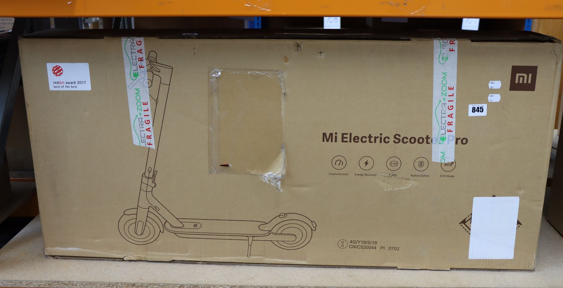 A boxed as new MI Electric Scooter Pro.