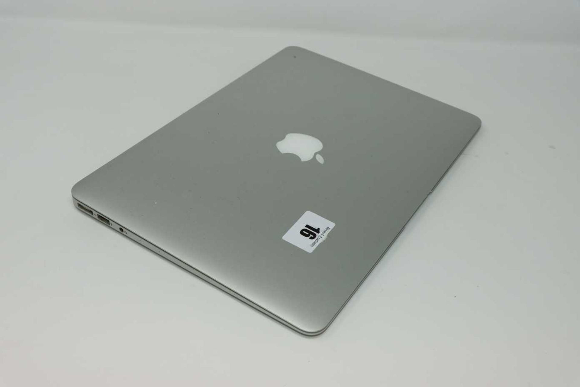 A pre-owned MacBook Air A1466 sold for parts (Serial: CQPK0Y0G4H1) (Does not power on. Liquid