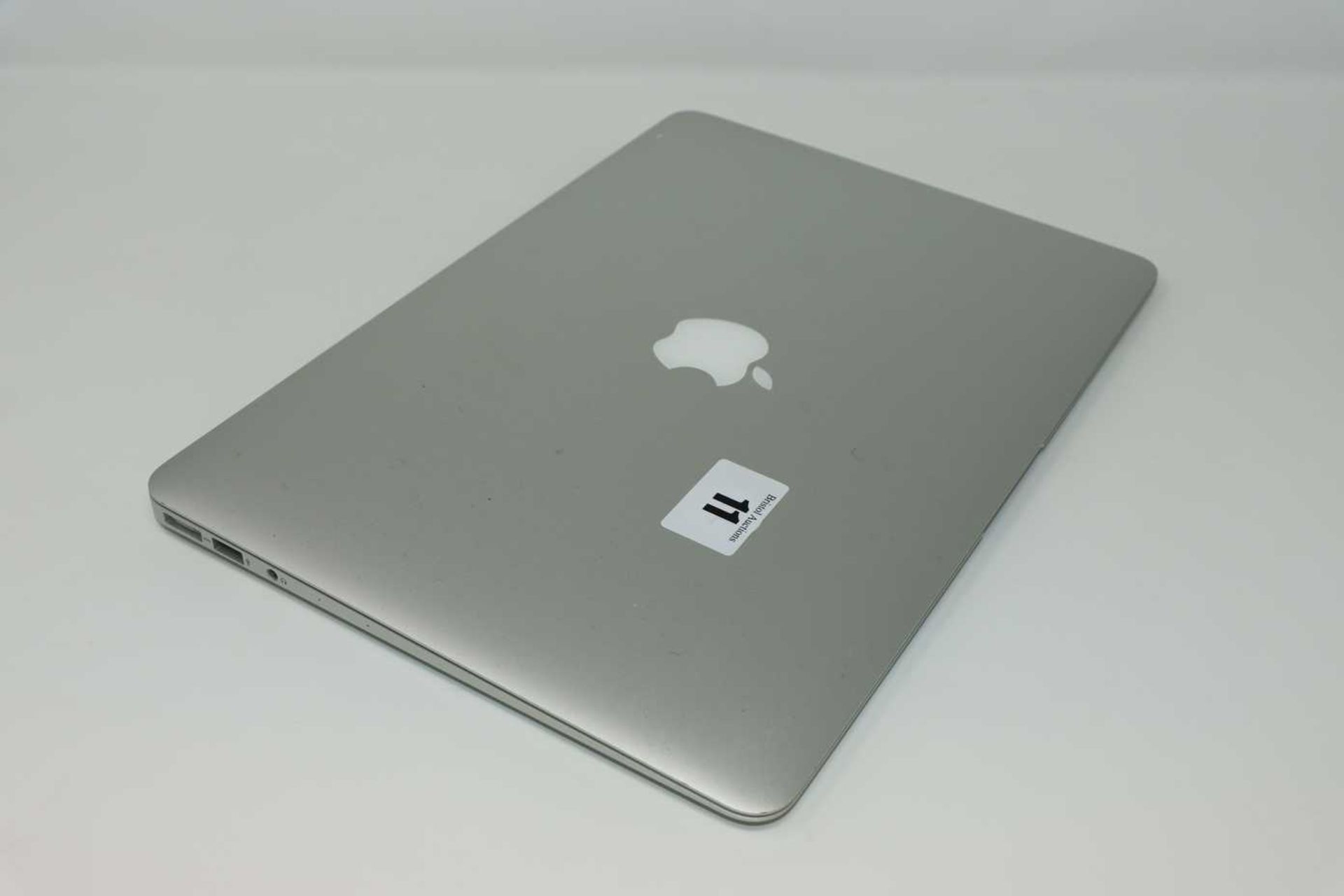 A pre-owned MacBook Air A1466 sold for parts (Serial: C1MSP3W8H3QD) (Liquid Damage, HD removed.