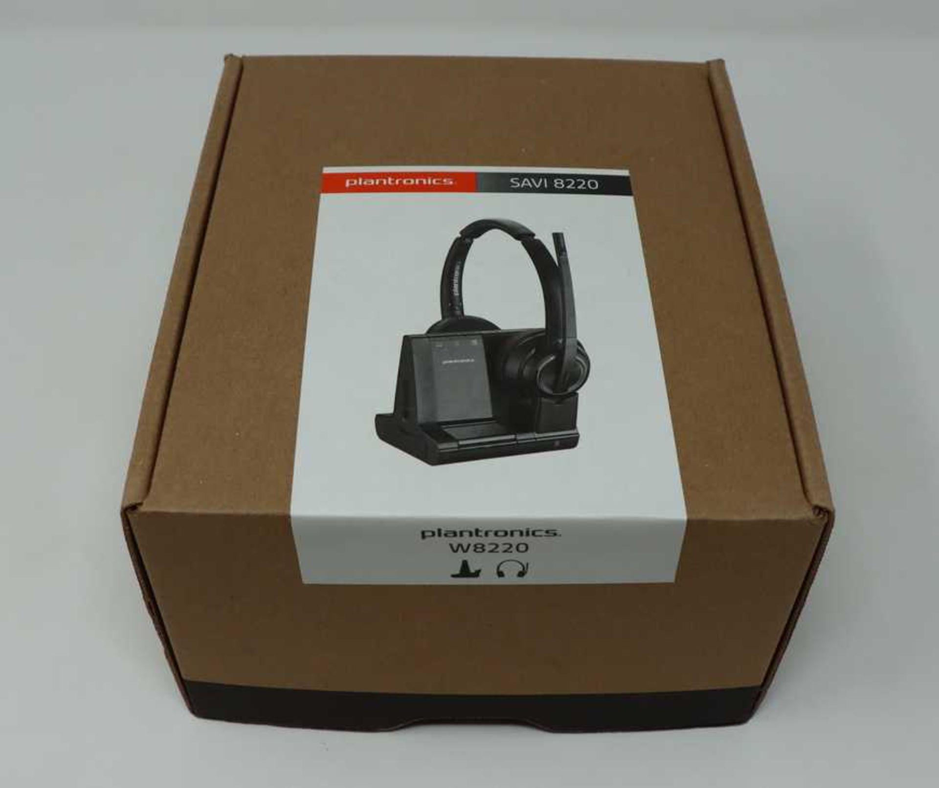 A boxed as new Plantronics Savi W8220 Wireless DECT Stereo Headset with Dock (Box opened).